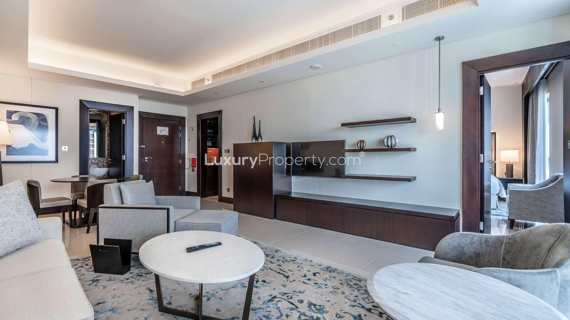Luxurious downtown Dubai apartment living room with modern décor and large windows