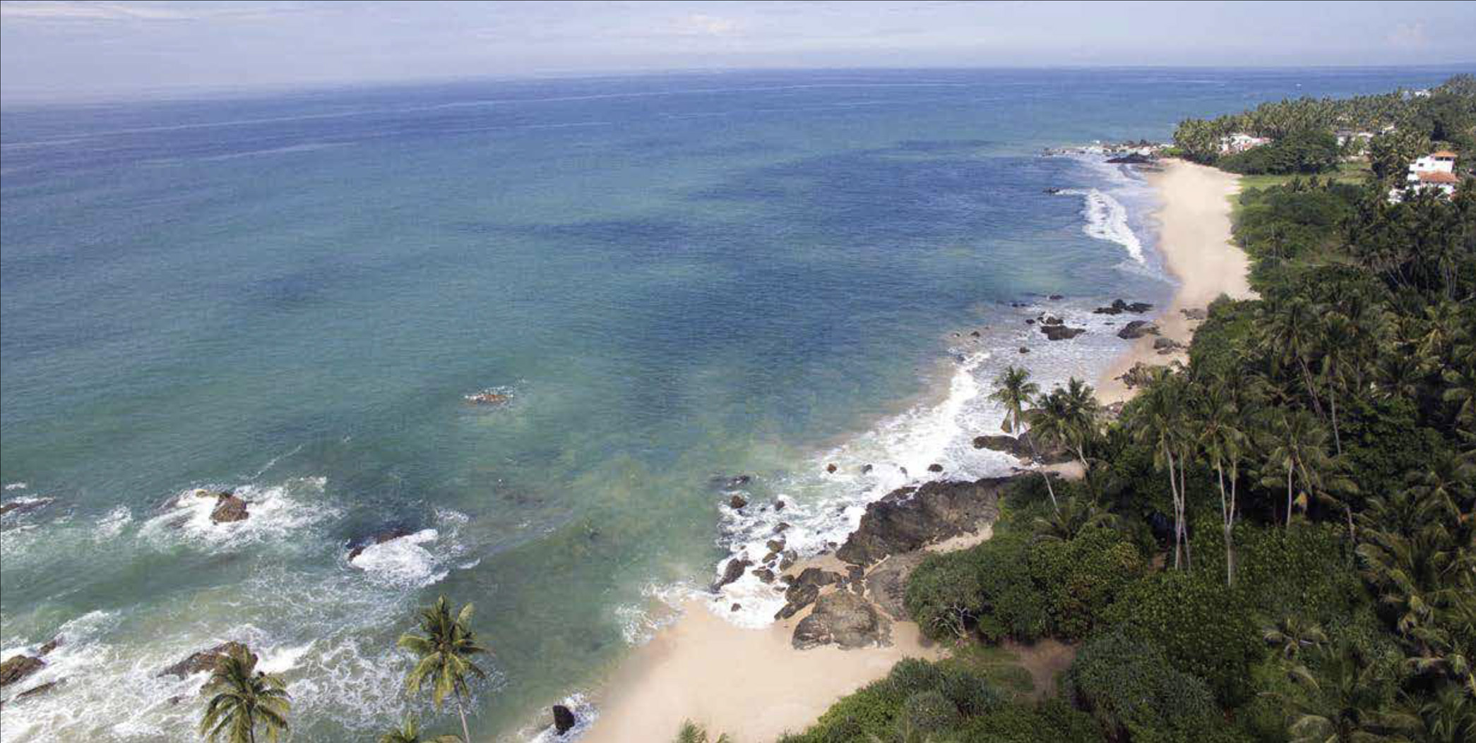 Beachfront view near luxurious Dusit Thani apartment in Balapitiya, Sri Lanka, for sale