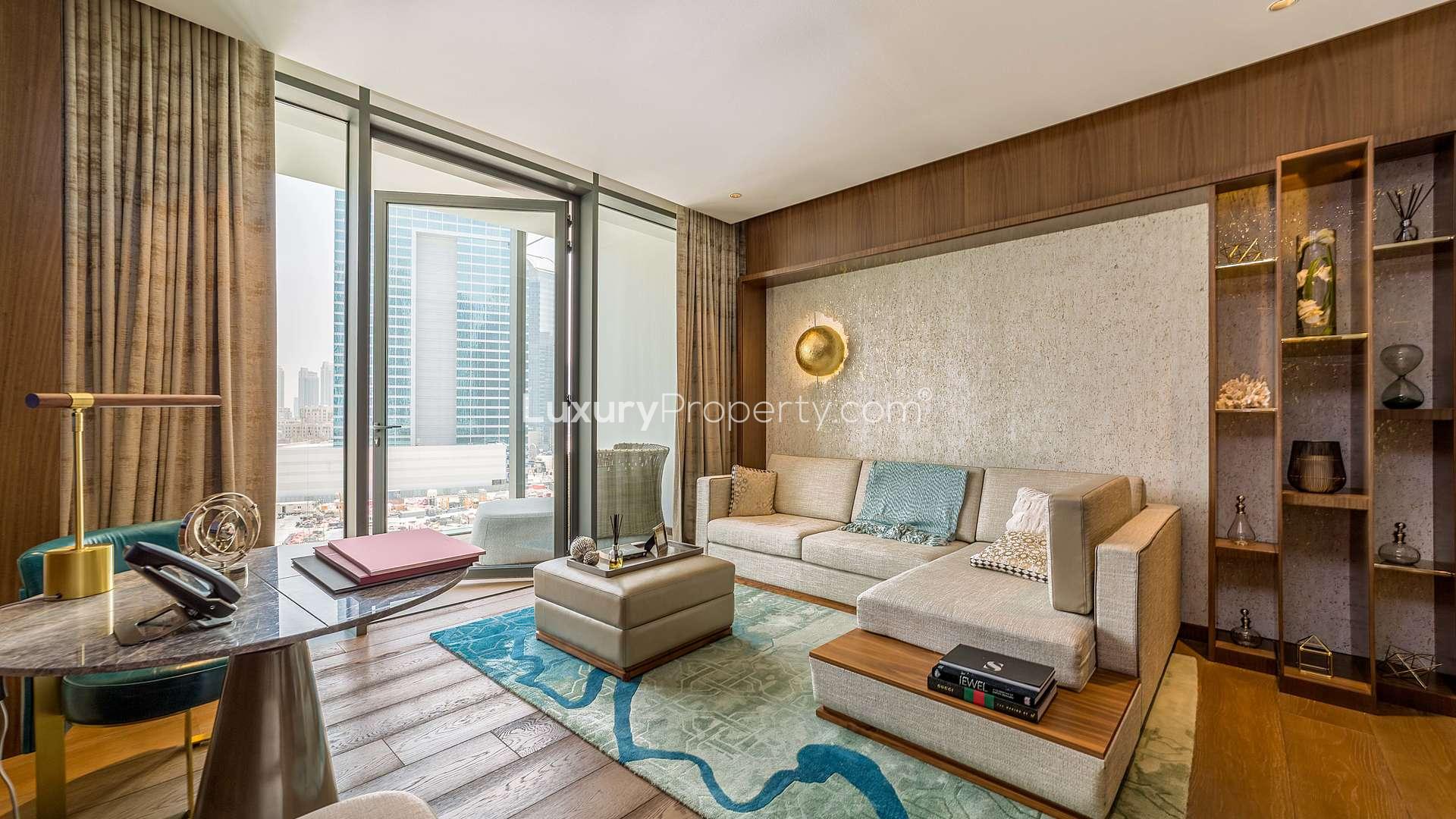 Elegant living room in 1-bedroom suite at Langham Place, Downtown Dubai, modern decor