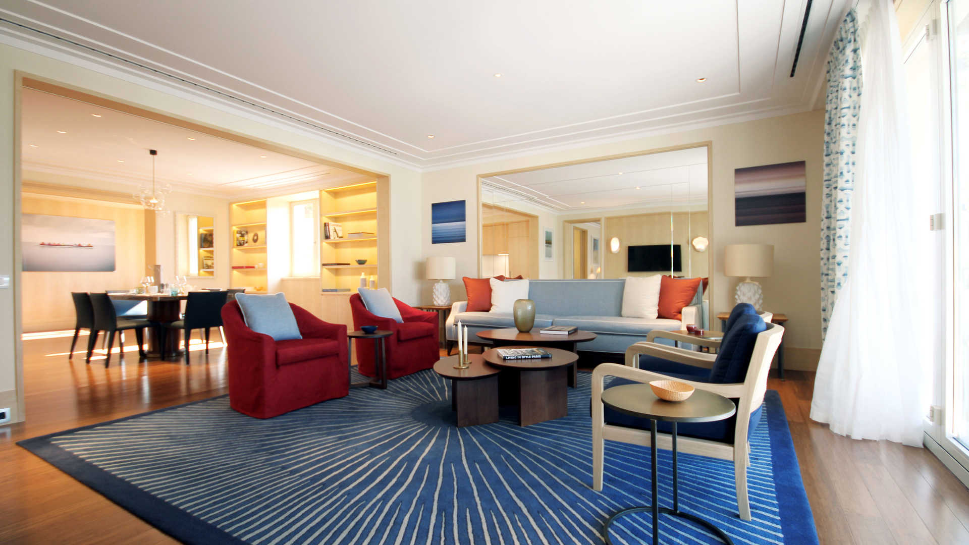 Modern dining and living area in Porto Montenegro serviced apartment, wooden floors and natural light