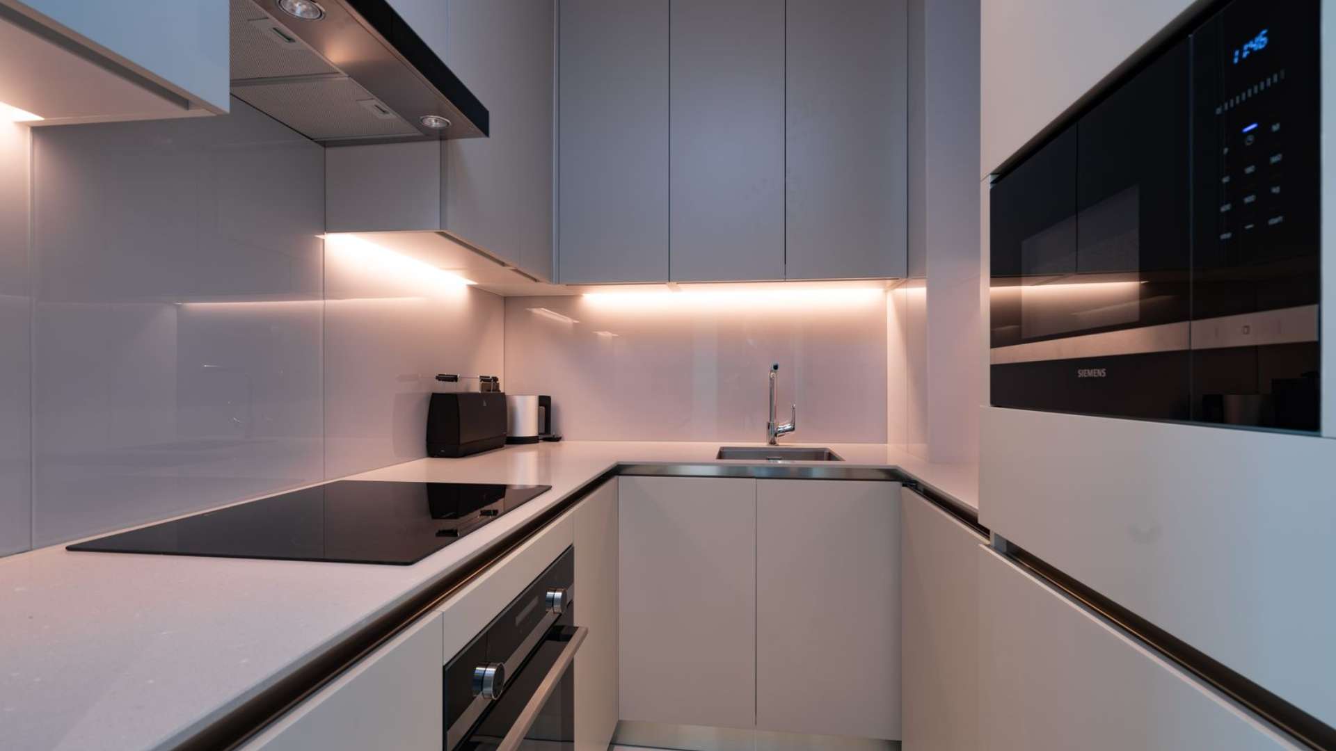 Modern kitchen and living area in serviced apartment, Address Jumeirah Beach Resort