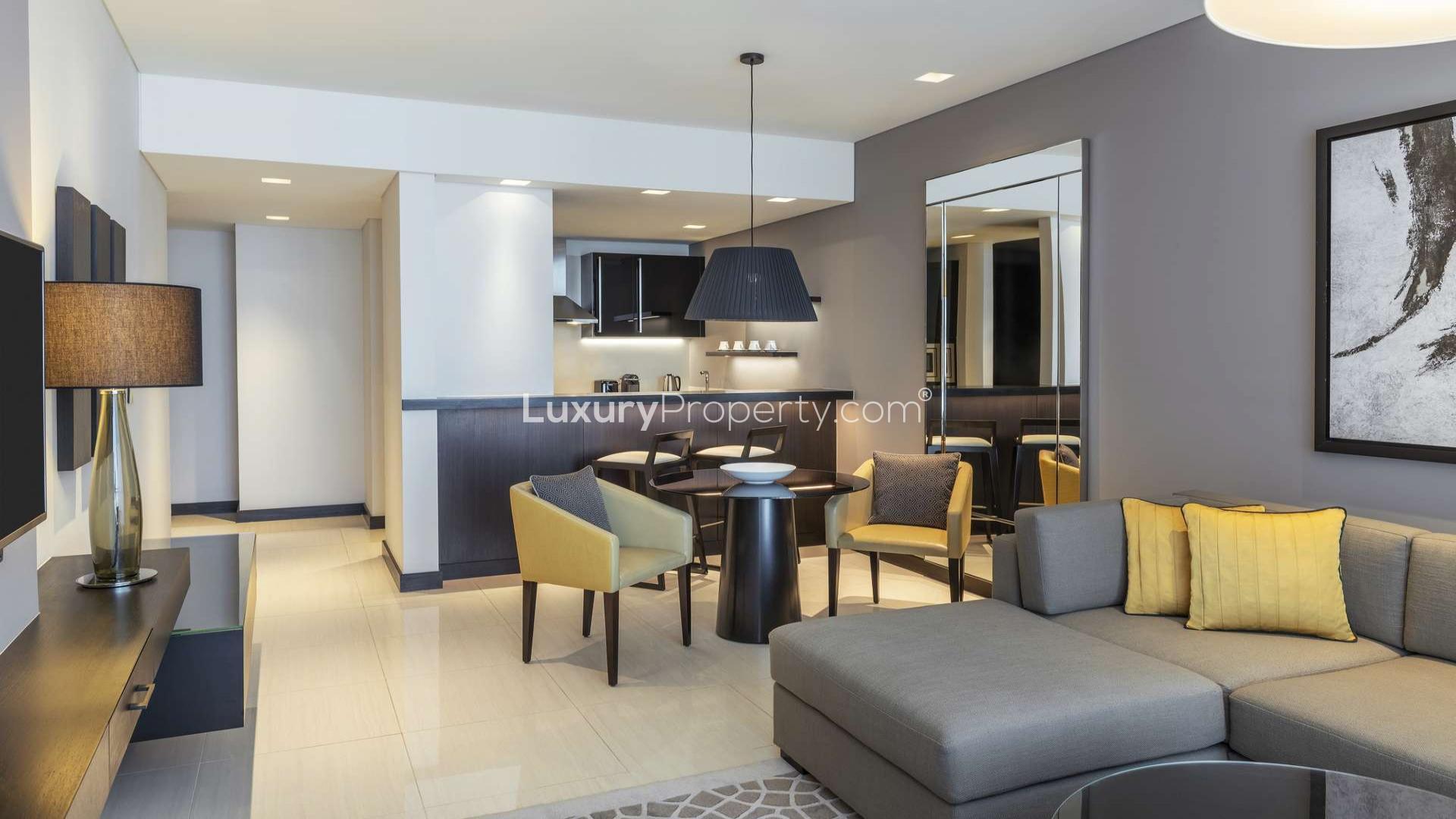 Modern living area in one-bed apartment, Sheraton Grand Hotel, Sheikh Zayed Road, available for rent