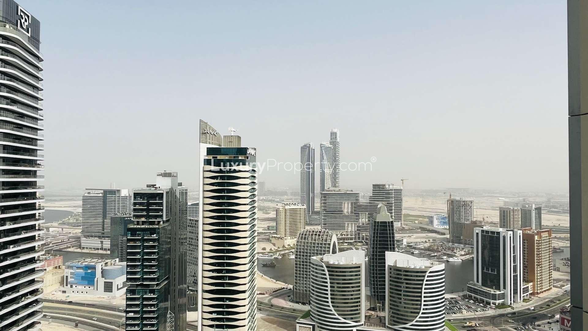 High-floor furnished living and dining area in Downtown Dubai apartment for rent