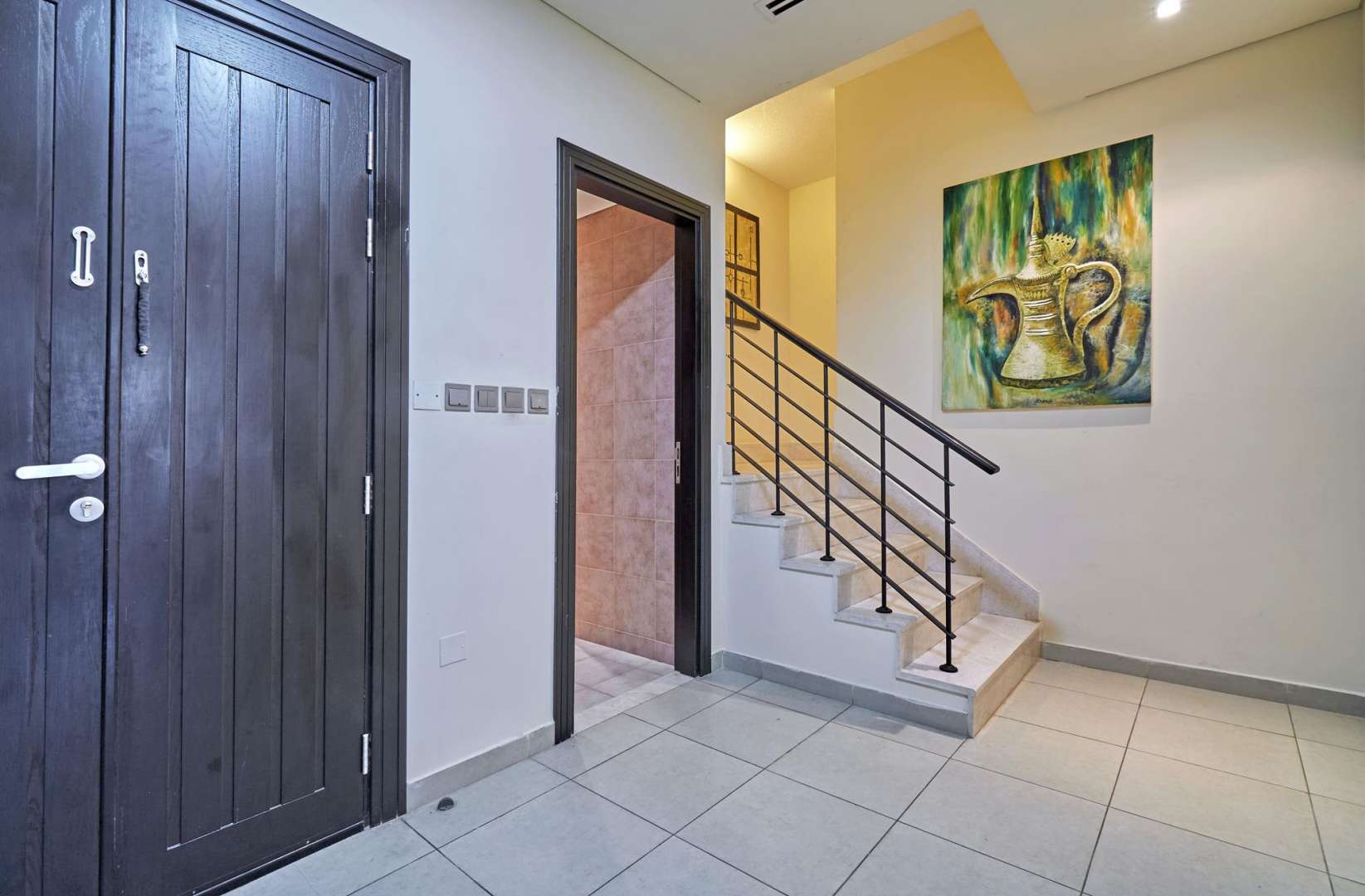 Furnished 1-bedroom townhouse exterior in Nakheel Townhouses, Jumeirah Village Circle for rent