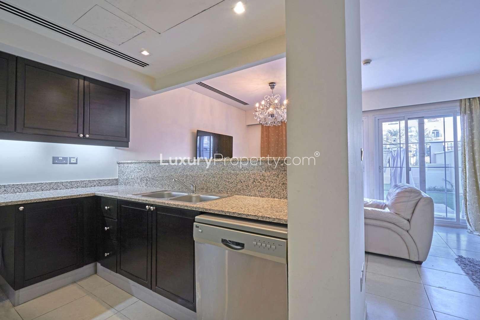 Furnished living and dining area in 1-bedroom townhouse, Nakheel Townhouses, Jumeirah Village Circle