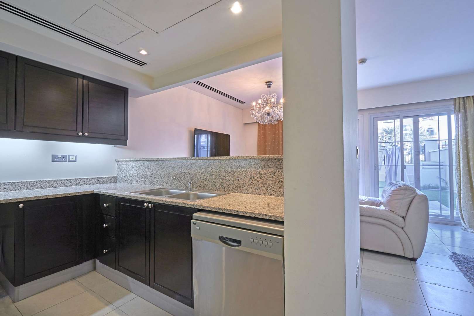 Furnished living and dining area in 1-bedroom townhouse, Nakheel Townhouses, Jumeirah Village Circle