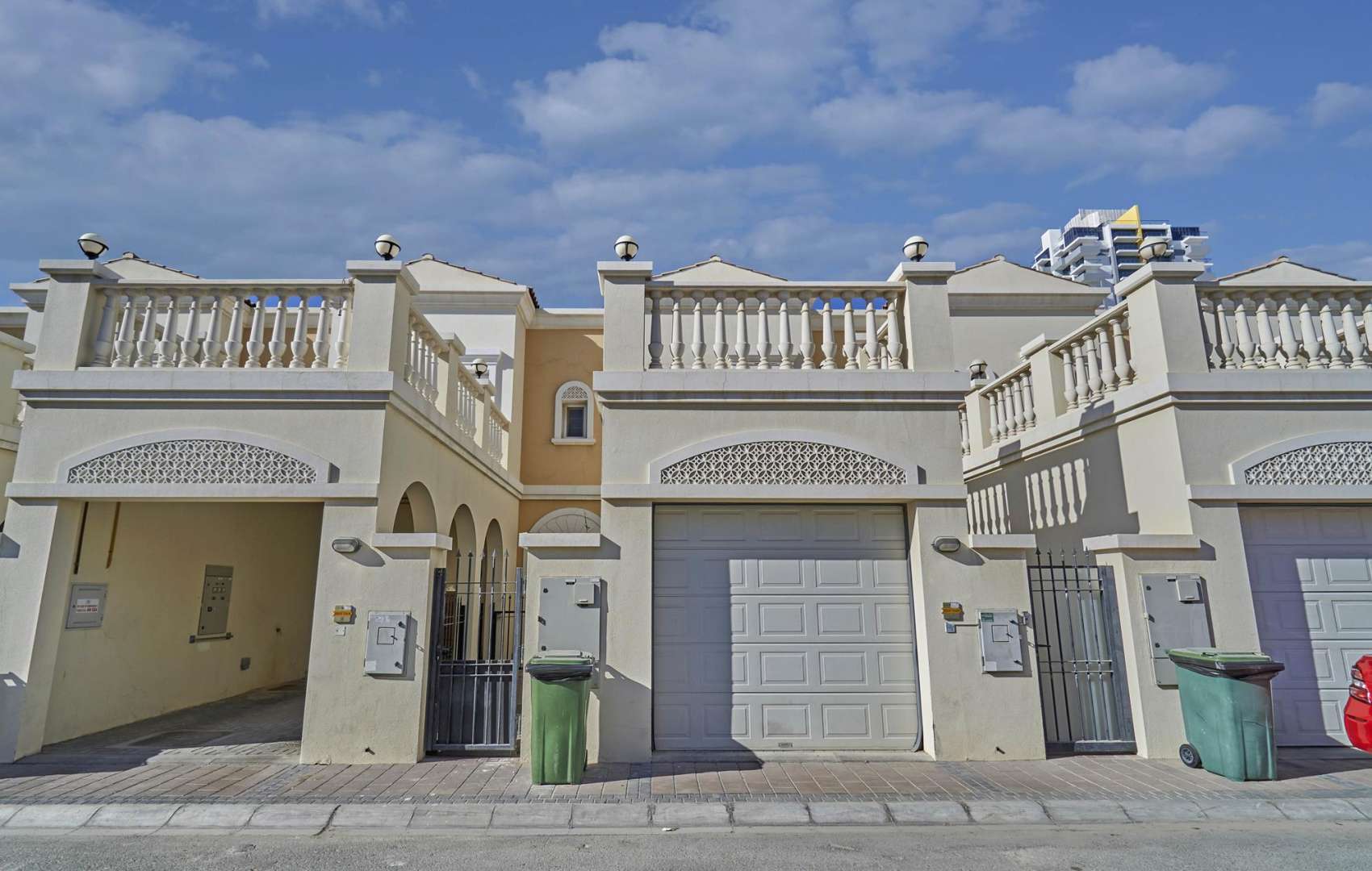 Empty room with balcony view in Jumeirah Village Circle townhouse for rent