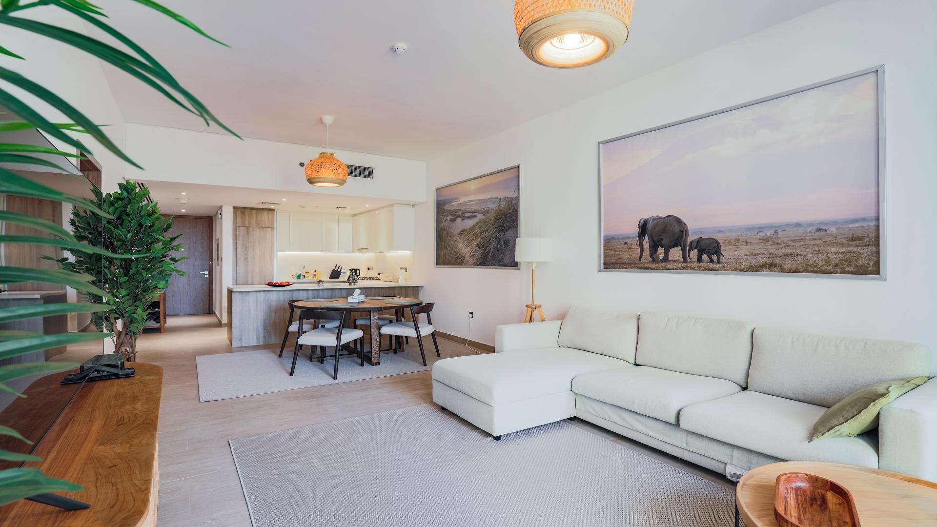 Stylish living area in 1-bedroom villa, Damac Hills 2, Adria Villas, open-plan design