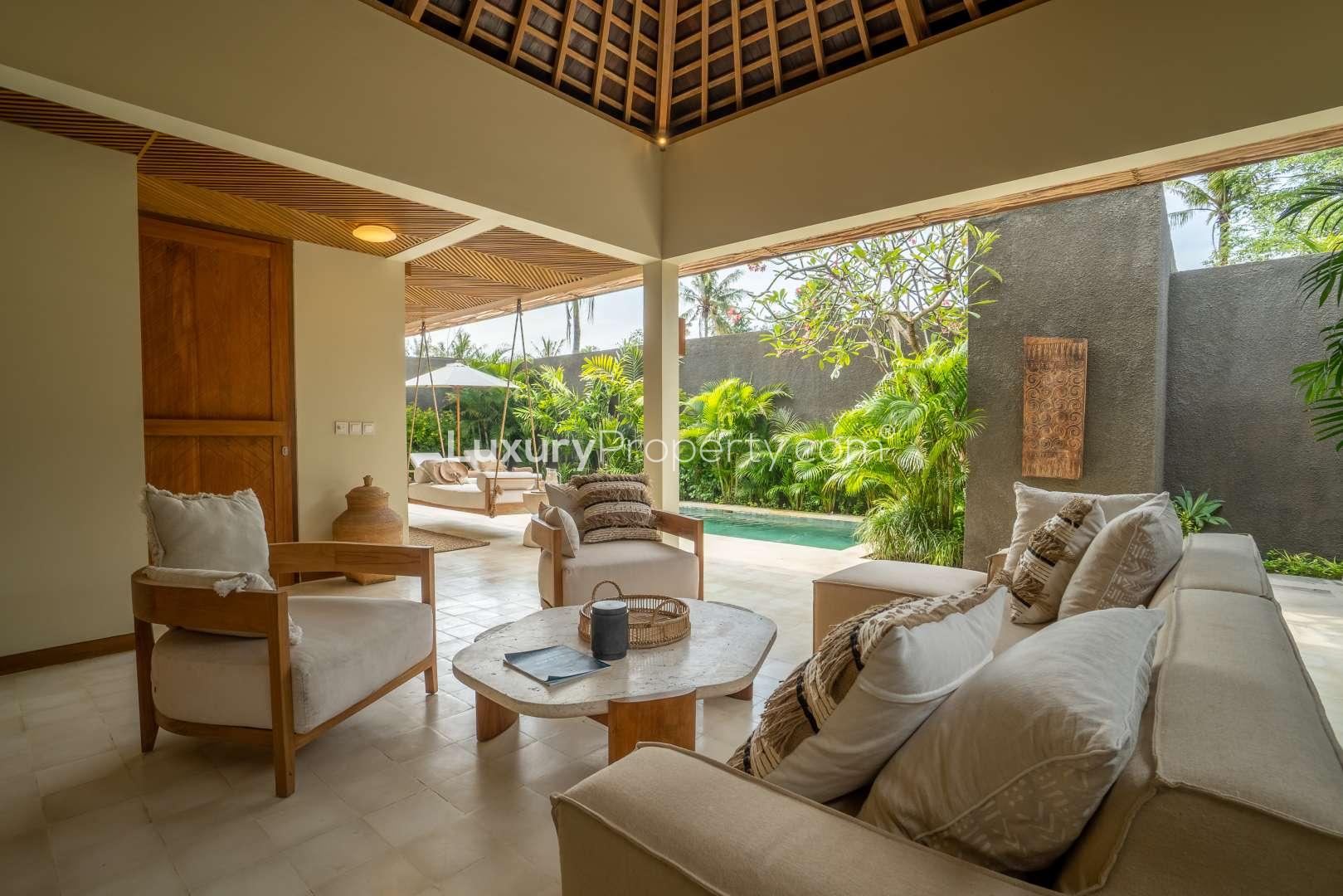 Luxurious bedroom in one-bedroom villa at Cocana Resort, Lombok with elegant canopy bed