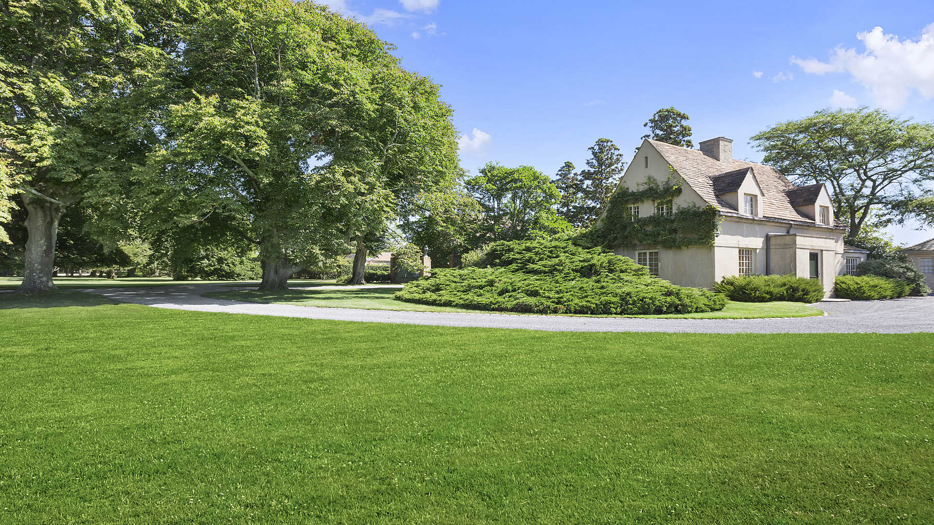 Fabulous French-style villa with lush green landscape at 660 Halsey Neck Lane, Southampton