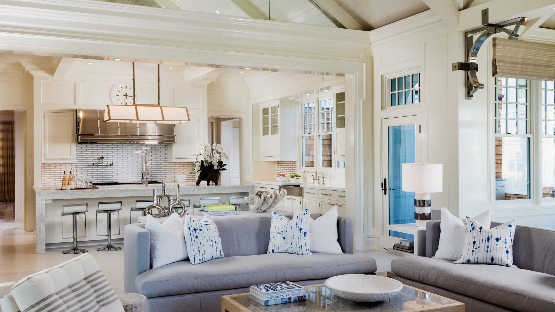 Outdoor lounge with fireplace at Southampton ten-bedroom estate, Hamptons villa for sale