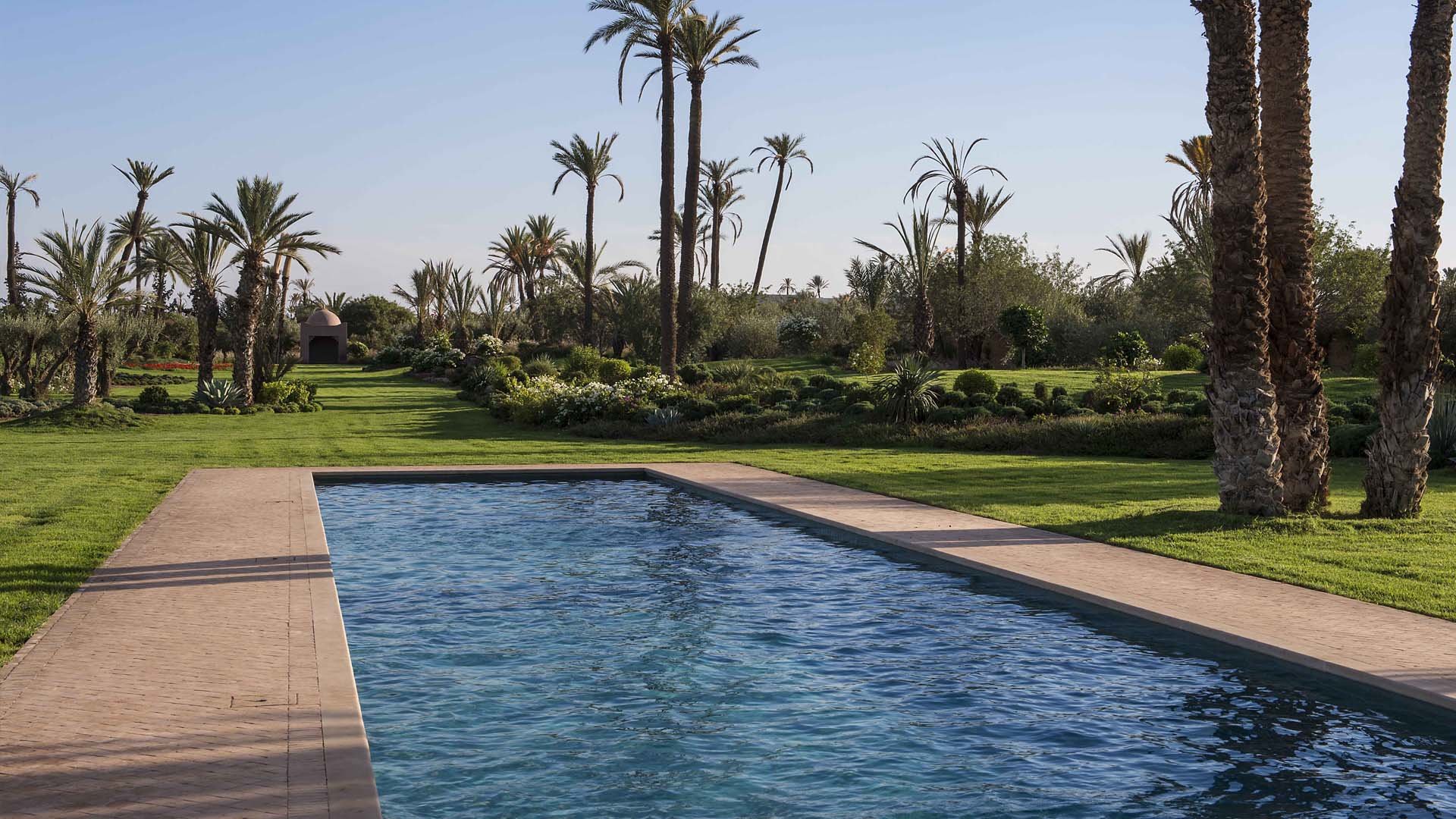 Elegant villa entrance at dusk, Villa Panorama, Palmeraie, Marrakech, for sale, 10 bedrooms