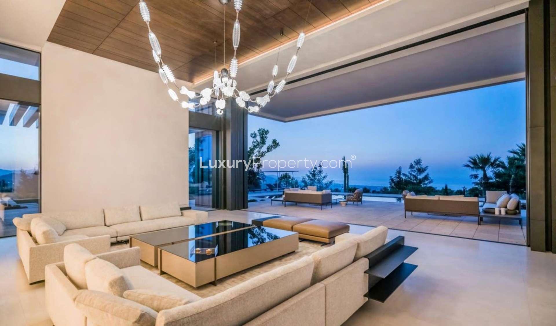 Ultra-luxury Villa Cullinan exterior at night, La Zagaleta, Marbella. Elegant design and lighting