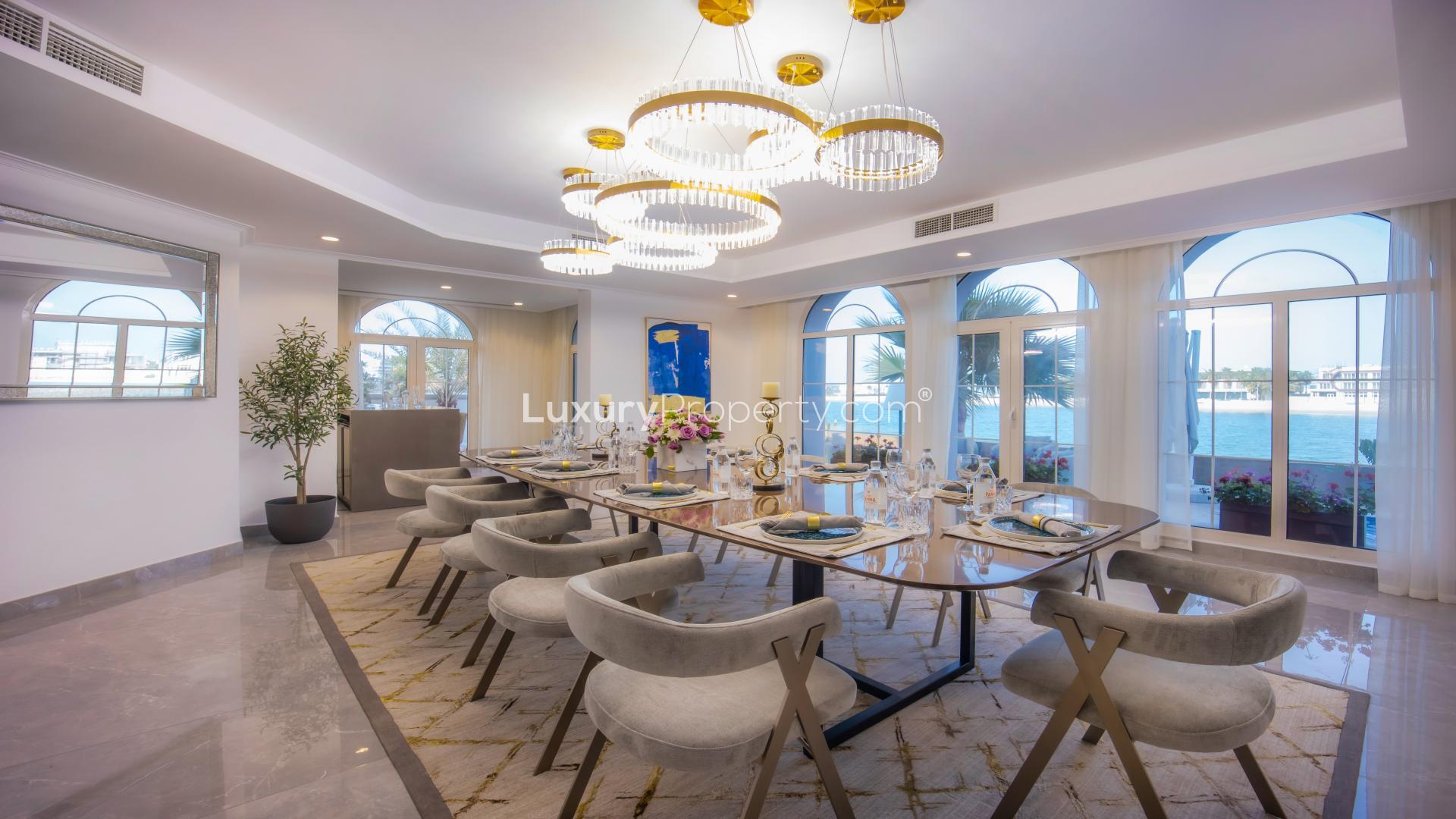 Luxurious living room in 11-bedroom villa, Palm Jumeirah Signature Villas, with grand piano