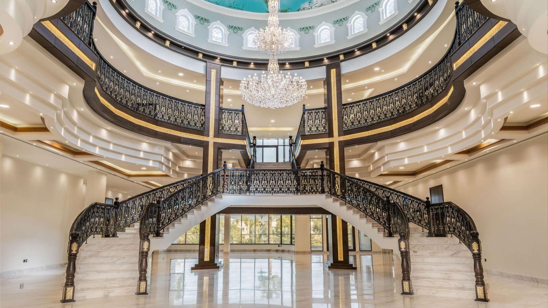 Grand staircase in luxury villa for rent in Emirates Hills, Sector L
