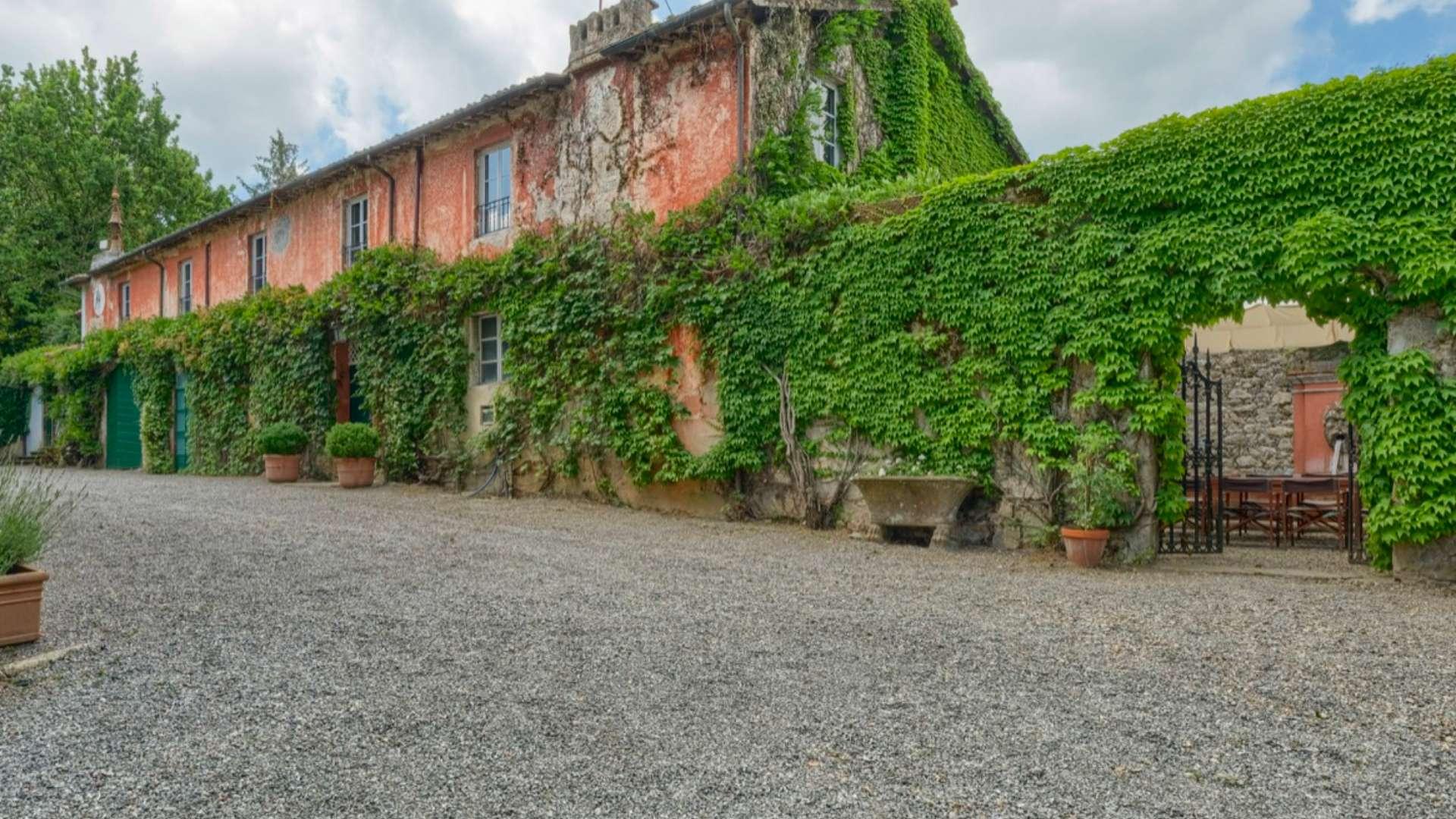 Elegant Lucca Aristocratic Manor Villa surrounded by lush greenery, available for sale