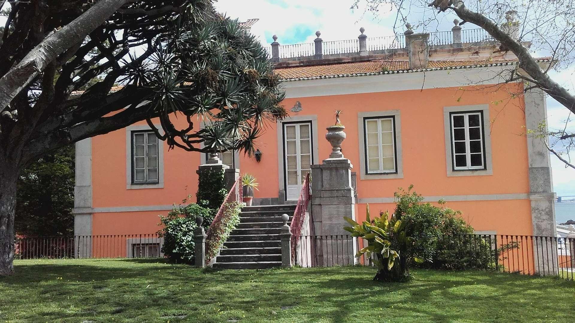 Neoclassical Palace villa exterior in Paço de Arcos, Portugal, gated entrance, for sale