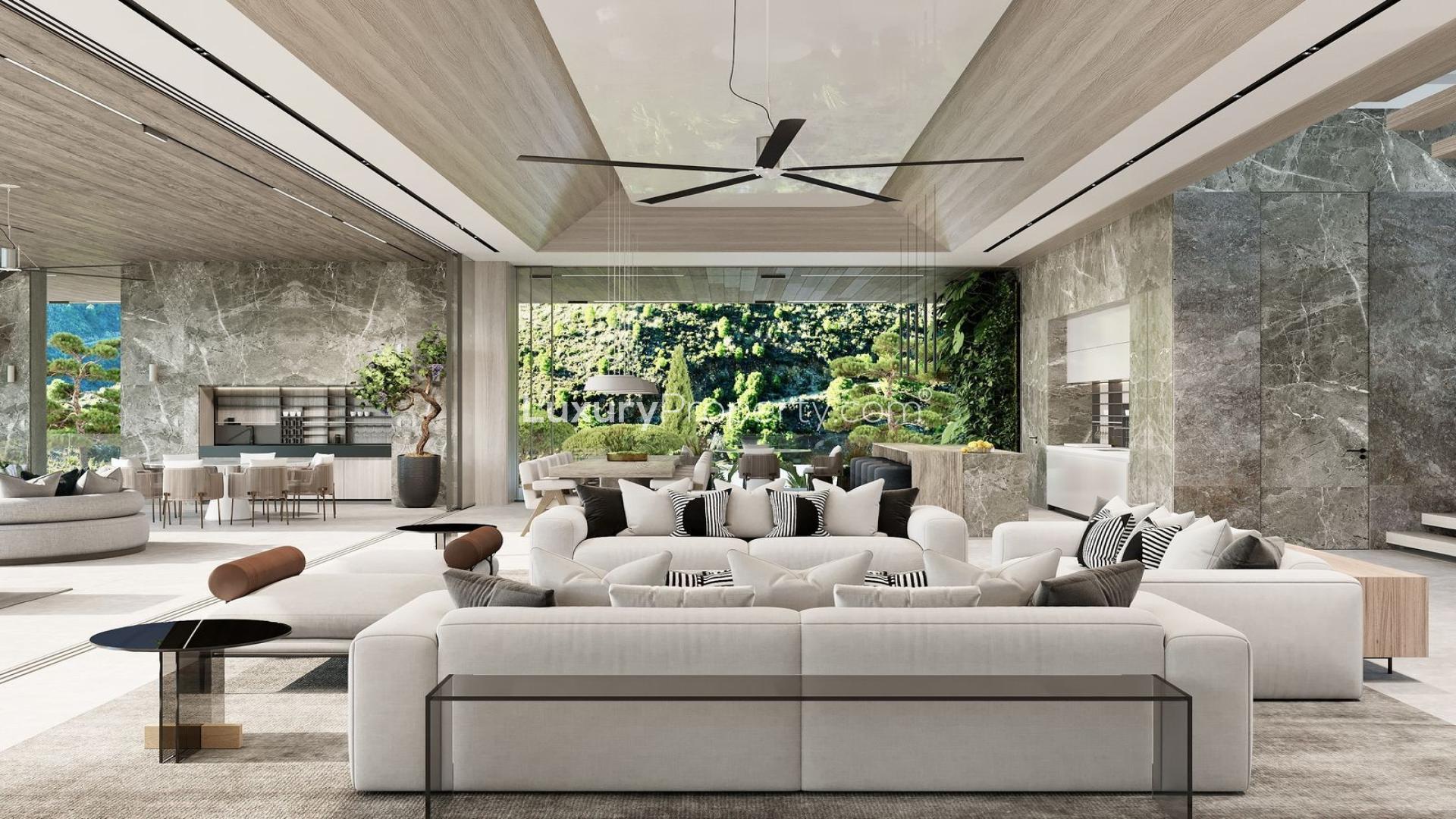 Outdoor pool and lounge area of luxury villa in La Quinta, Málaga