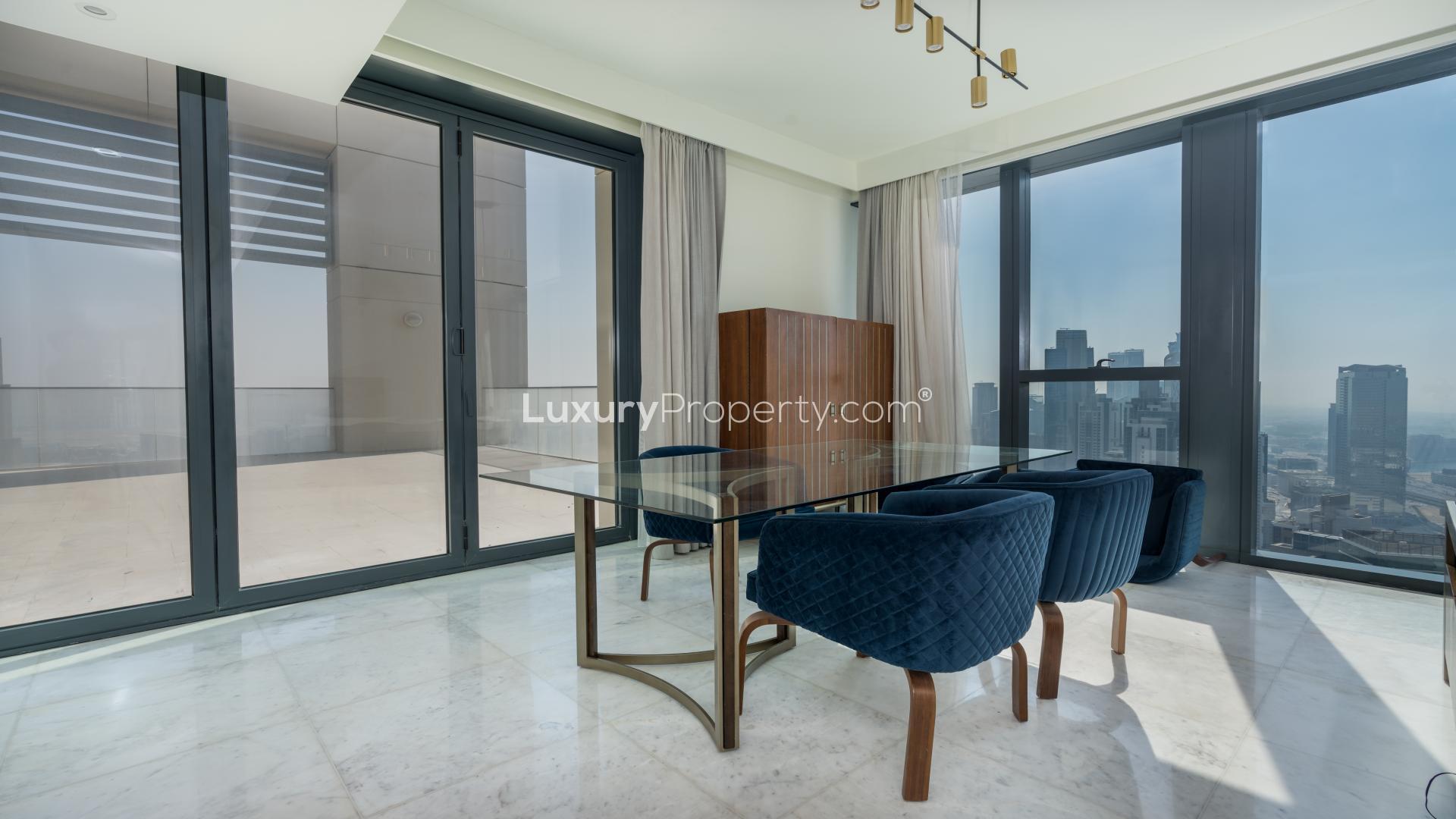 Furnished high-floor apartment living room with modern decor in Downtown Dubai, BLVD Heights