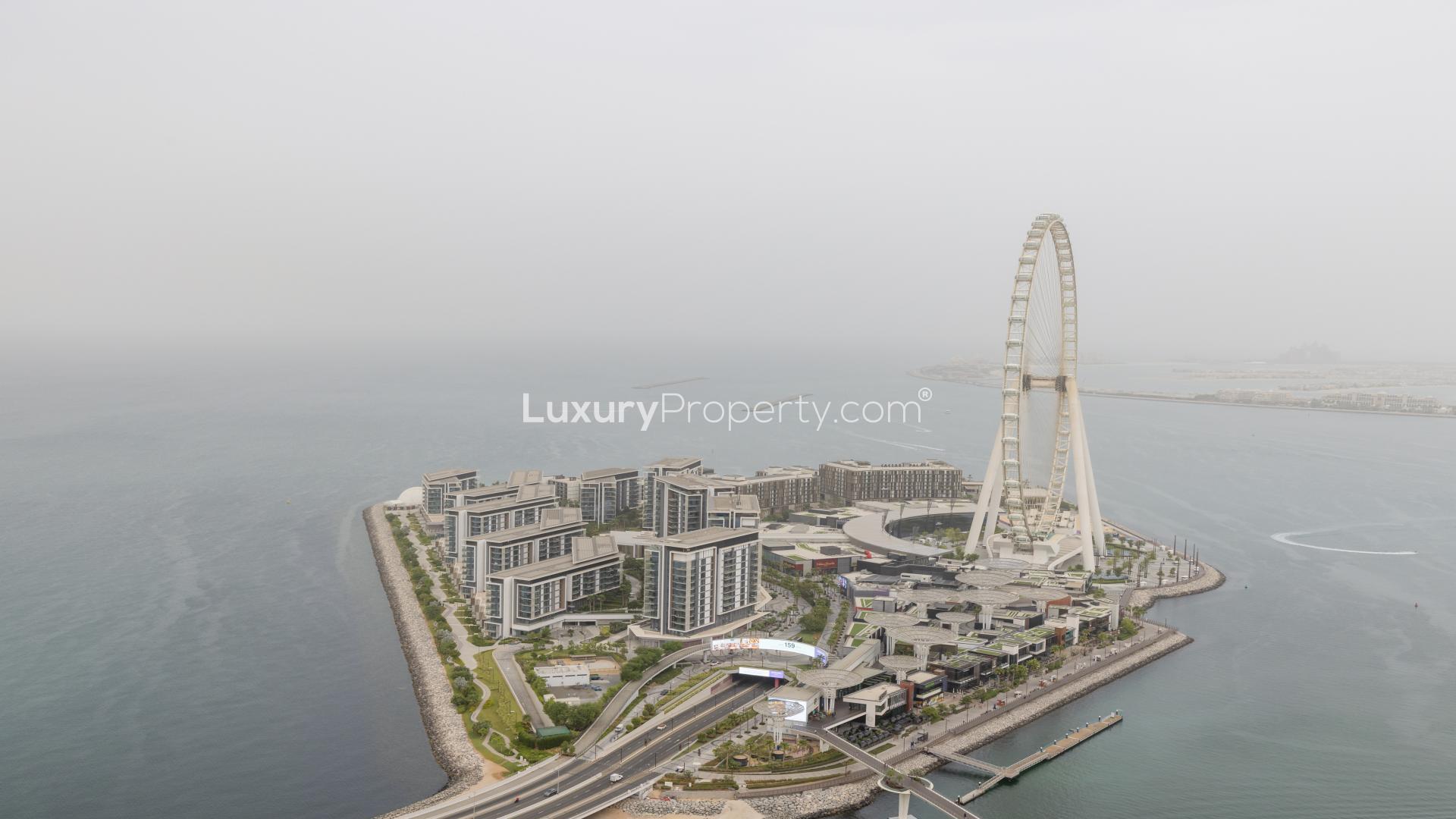 Modern living room in serviced apartment, Jumeirah Beach Residence, with elegant decor and plush seating