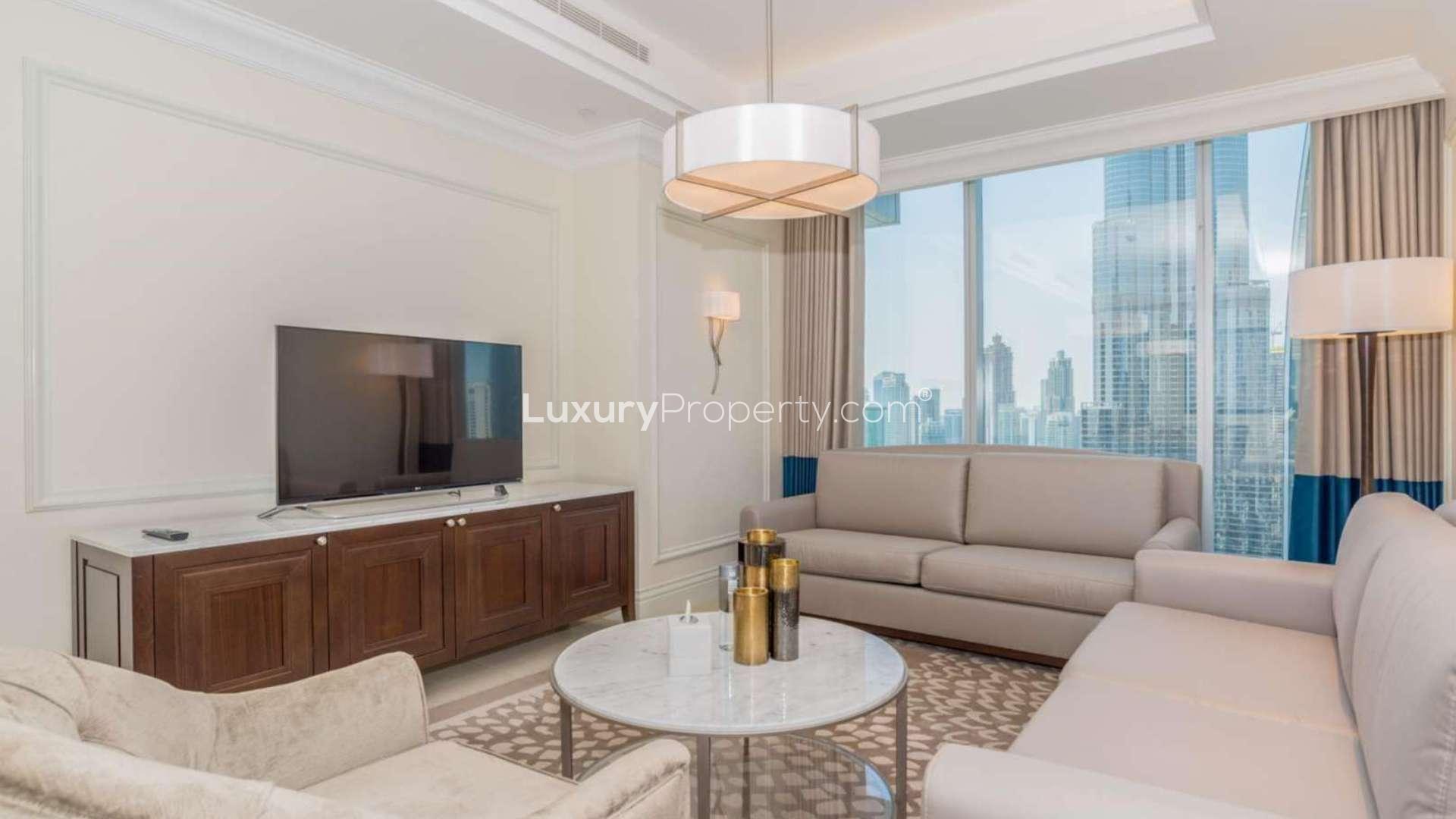 Furnished high-floor apartment living room in Downtown Dubai with modern decor and amenities