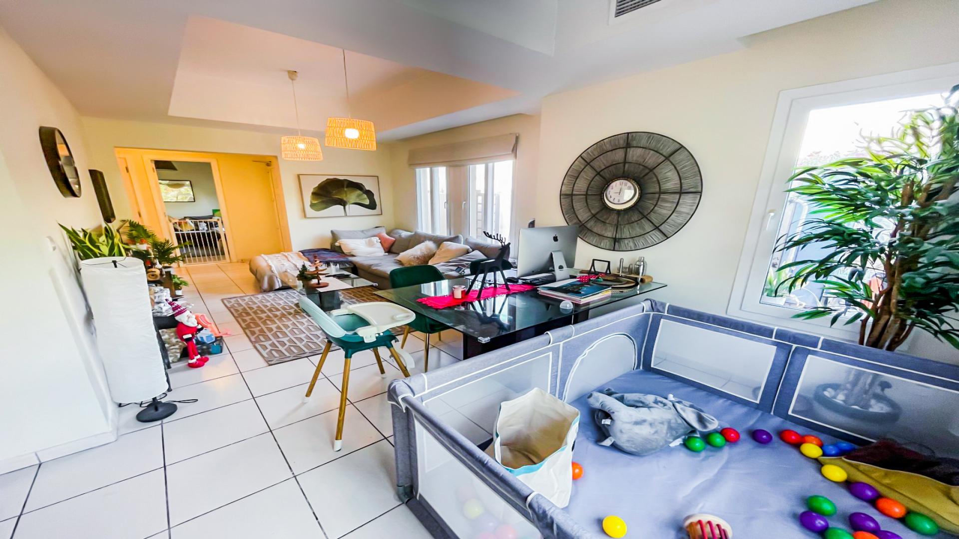 Living room in 2-bed villa, Maeen, The Lakes, with cozy seating and modern decor