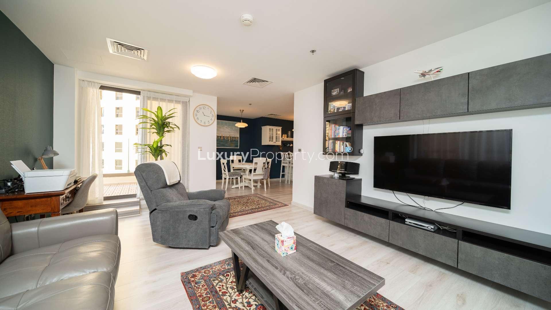 Furnished living room in upgraded Jumeirah Beach Residence apartment, Shams community, for sale