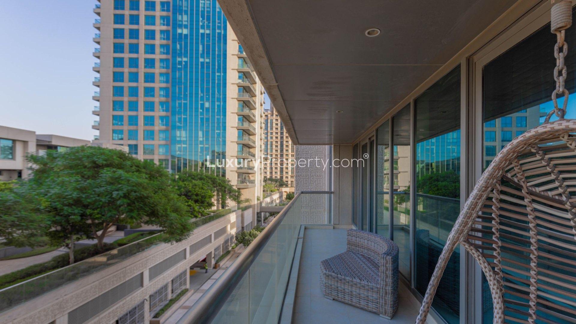 Spacious Fairways West apartment living room with large windows and modern decor