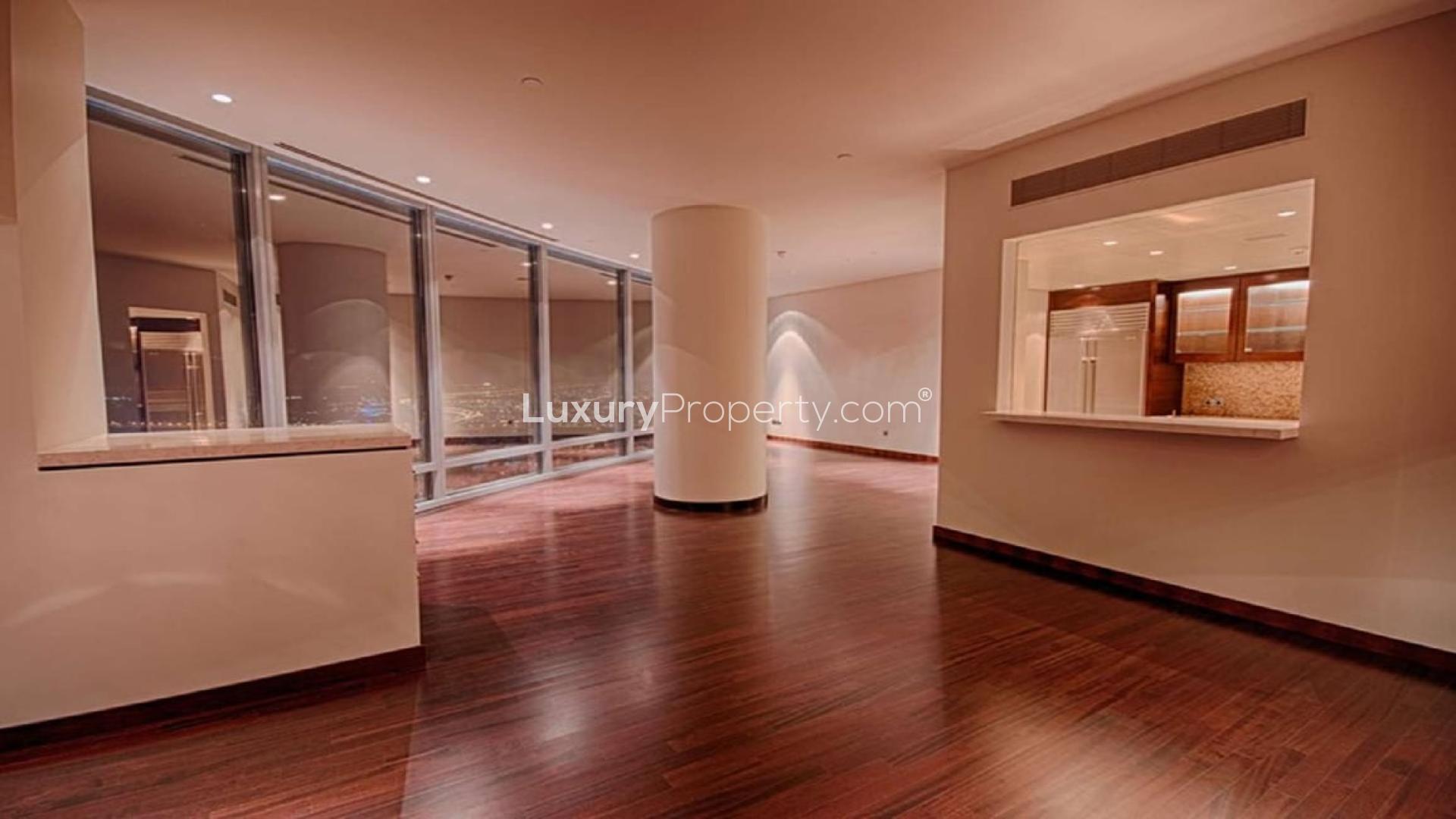 High-floor apartment interior with wooden floors and large windows in Burj Khalifa, Downtown Dubai