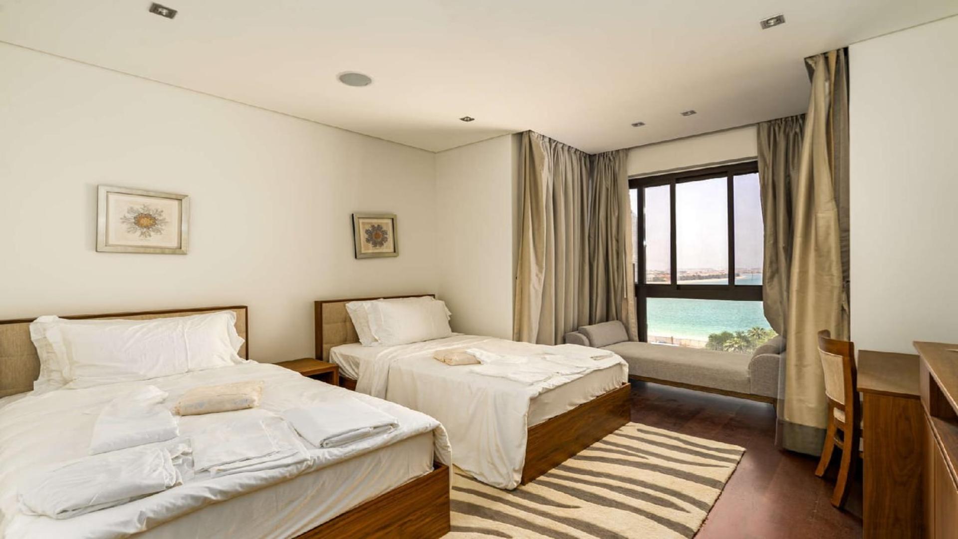 Living room in 2-bedroom apartment, Anantara Residences, Palm Jumeirah, modern decor, spacious layout