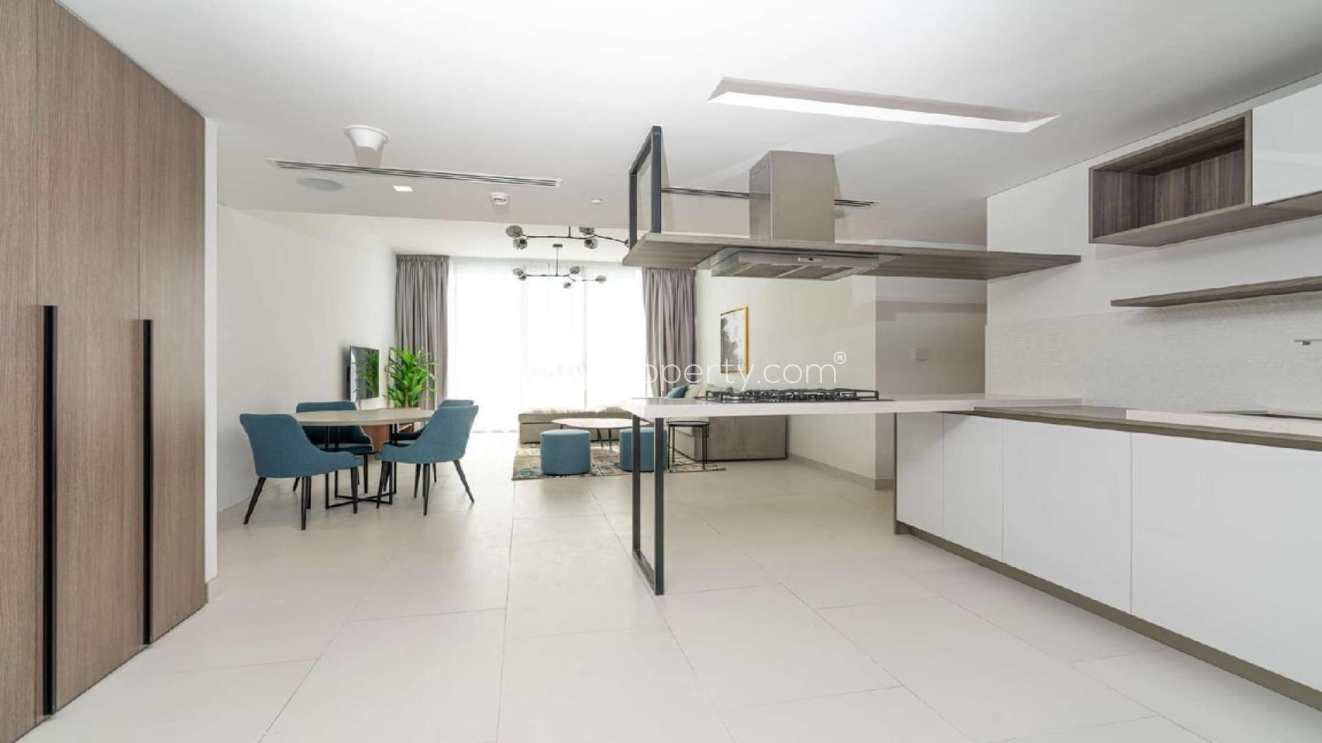 Modern kitchen and dining area in Soho Palm Jumeirah apartment for rent