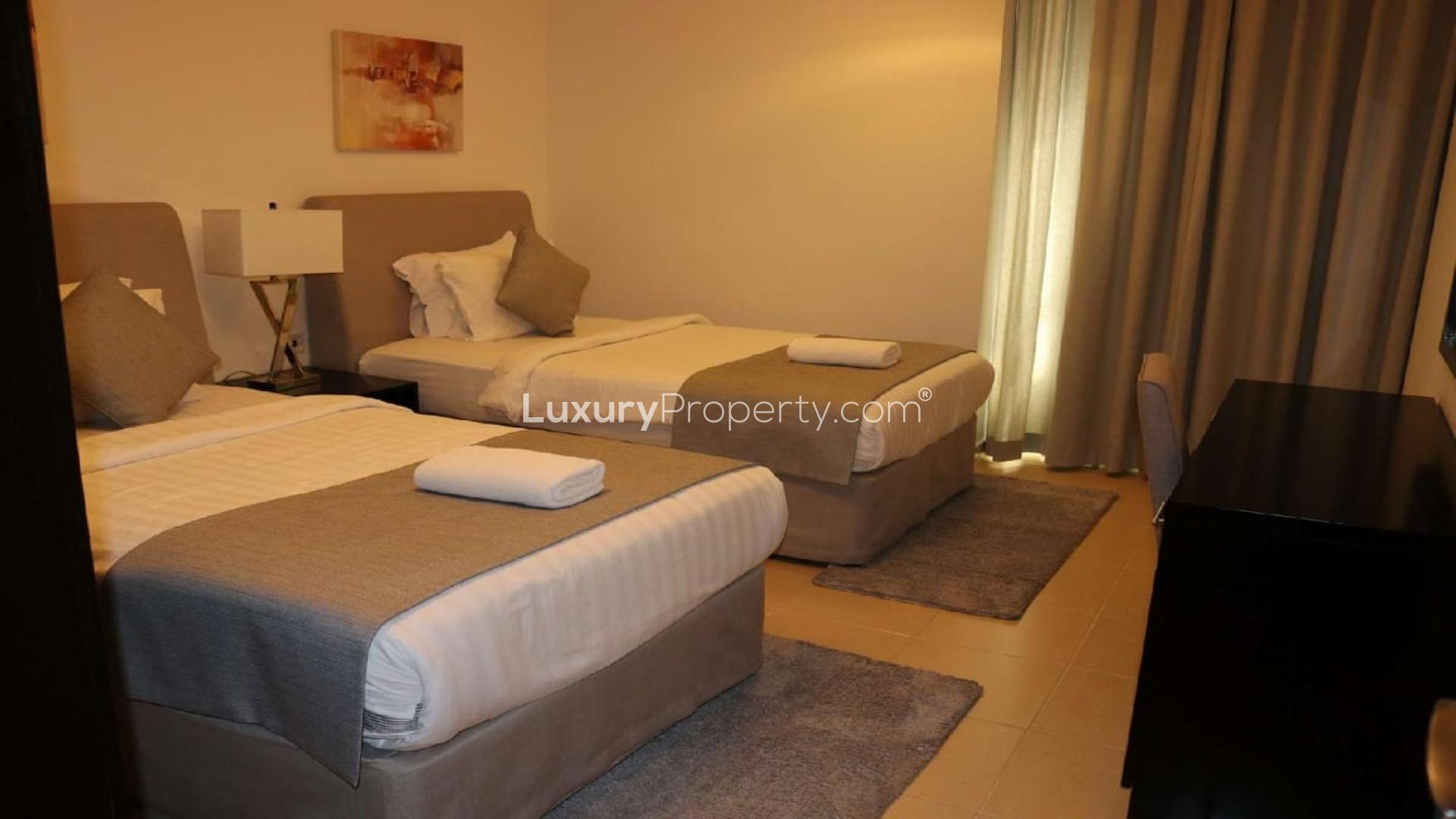 Furnished living room in 2-bedroom apartment, Shams 1, JBR, with modern decor and TV