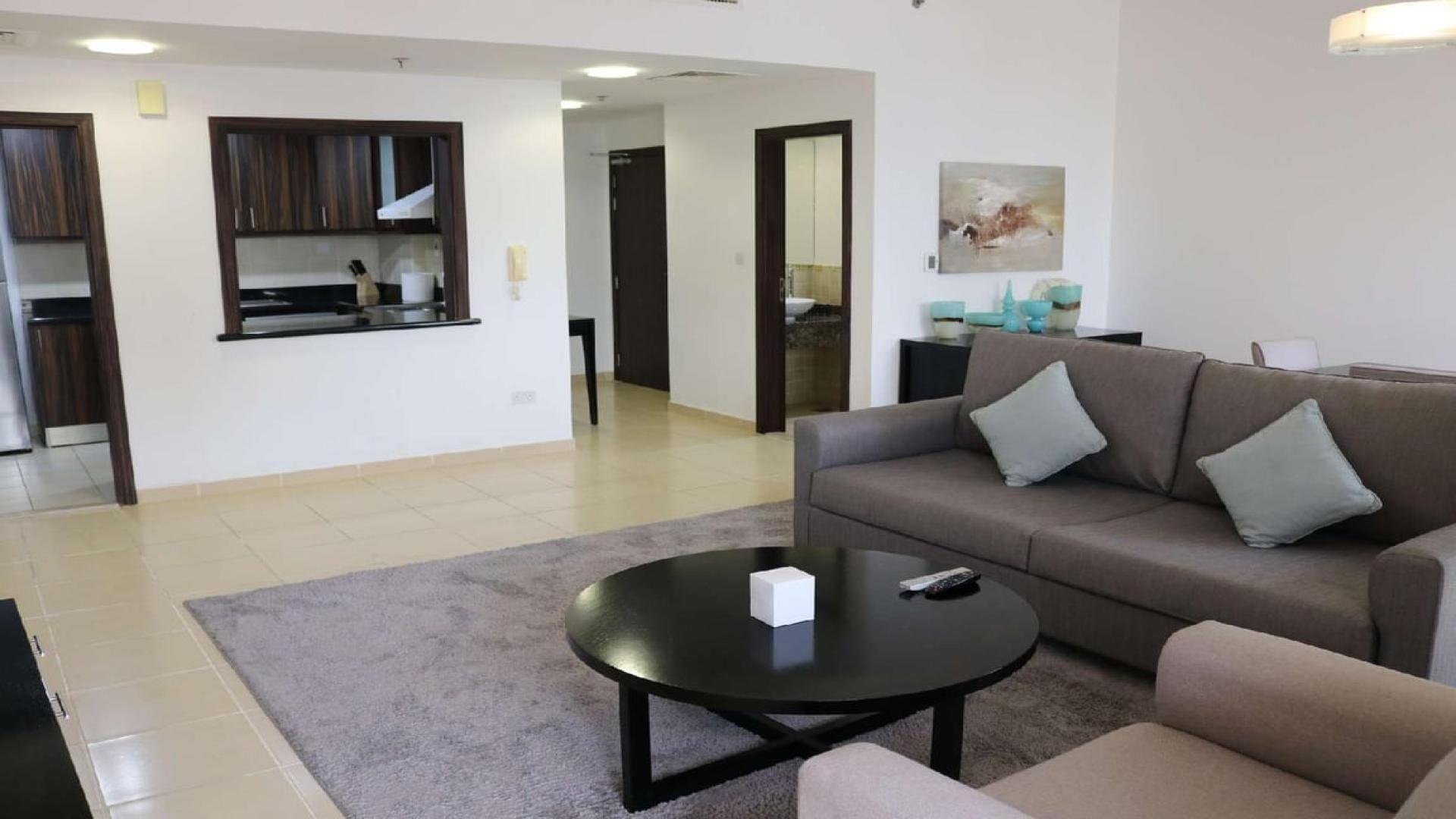 Furnished living room in 2-bedroom apartment, Shams 1, JBR, with modern decor and city view