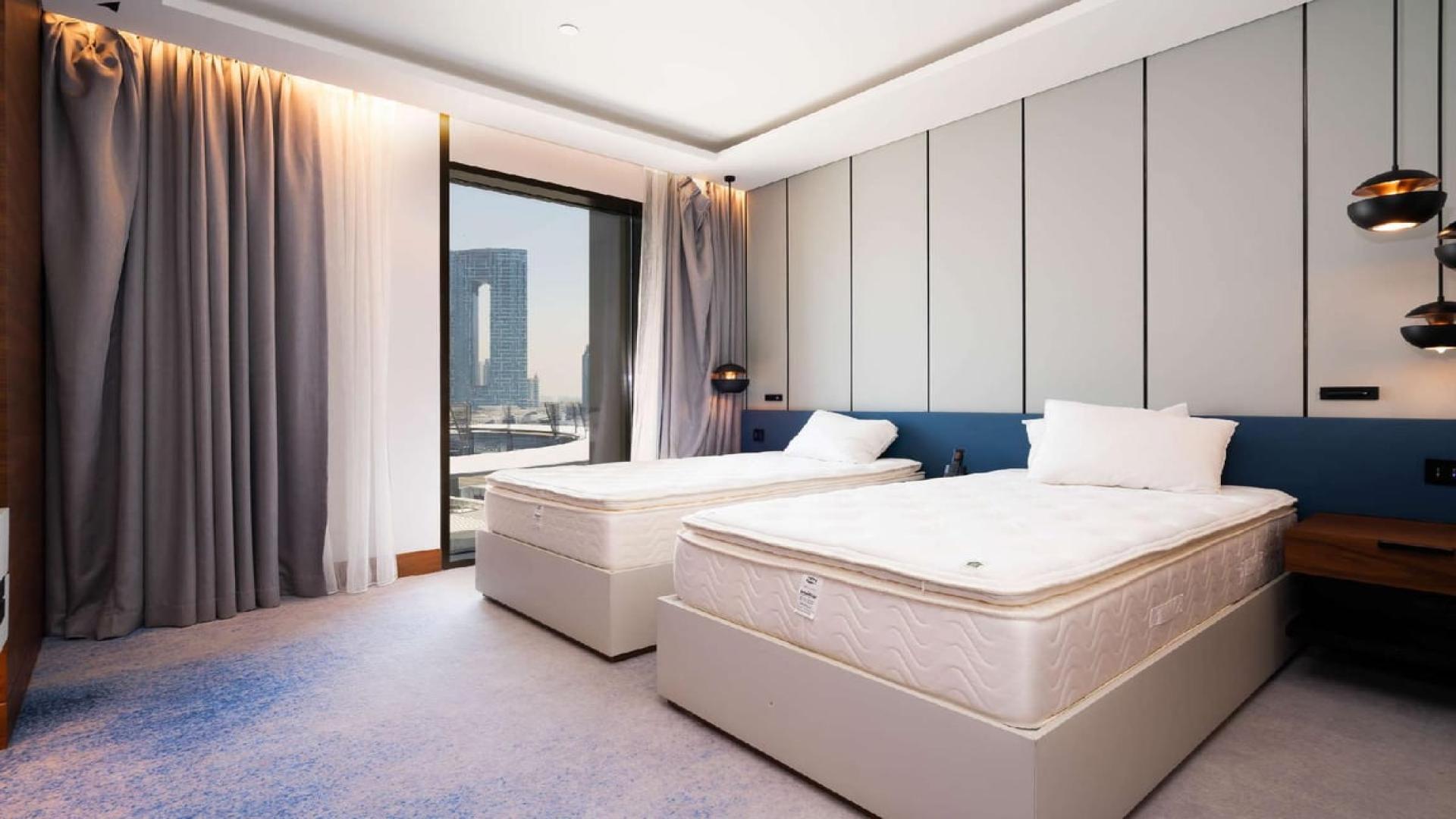 Two-bedroom apartment interior at Caesars Resort, JBR with modern decor and city view