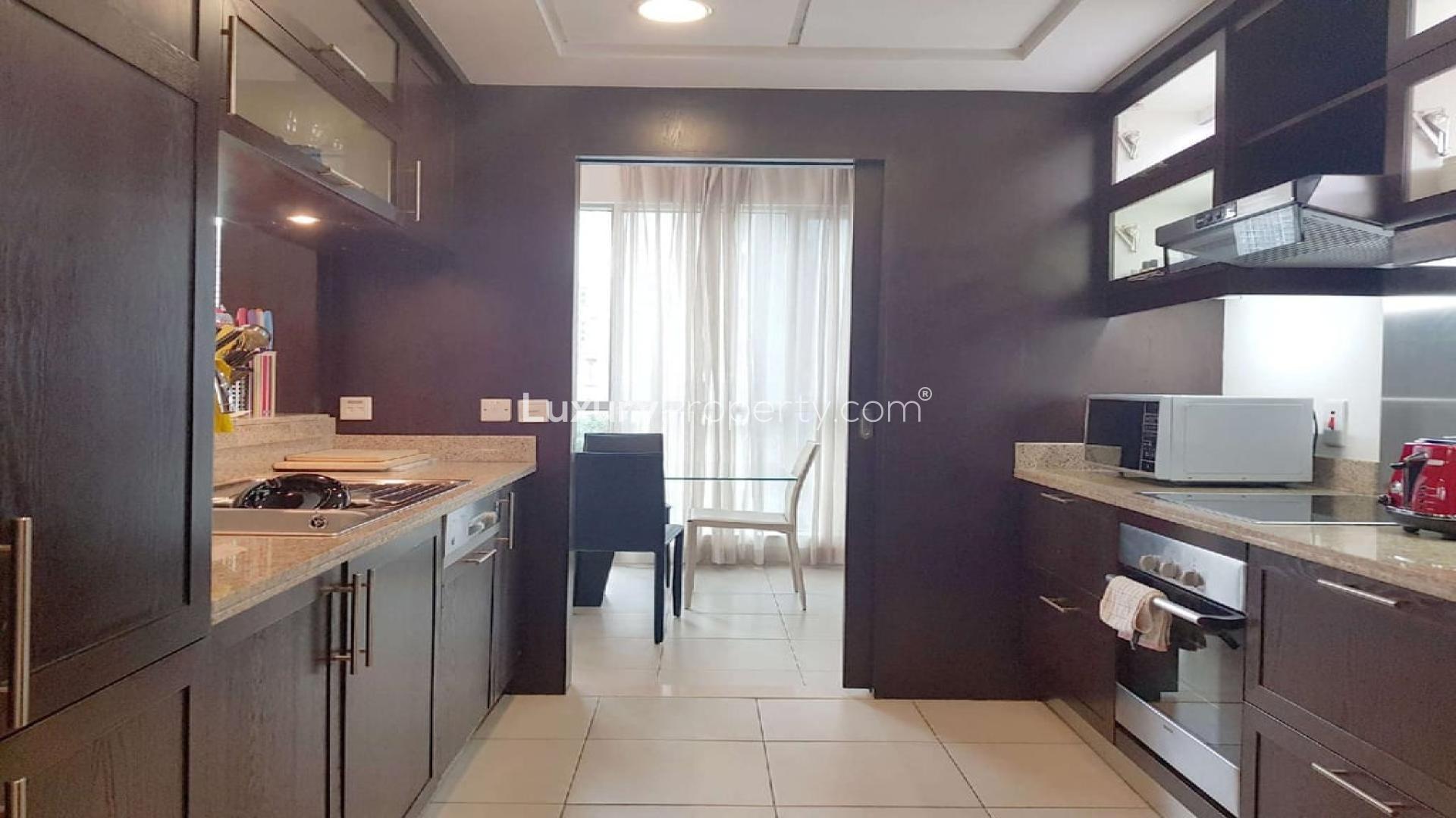 Elegant furnished apartment dining area with large windows in Downtown Dubai, The Residences