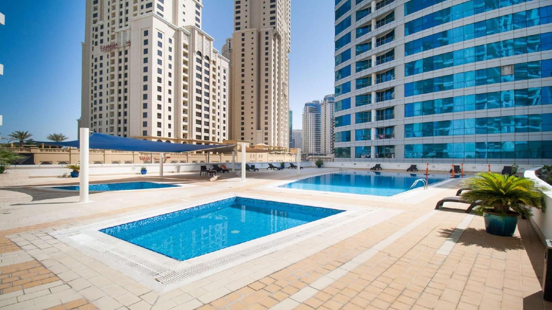Stylish living room in waterfront 1-bedroom apartment, Dorra Bay, Dubai Marina for rent
