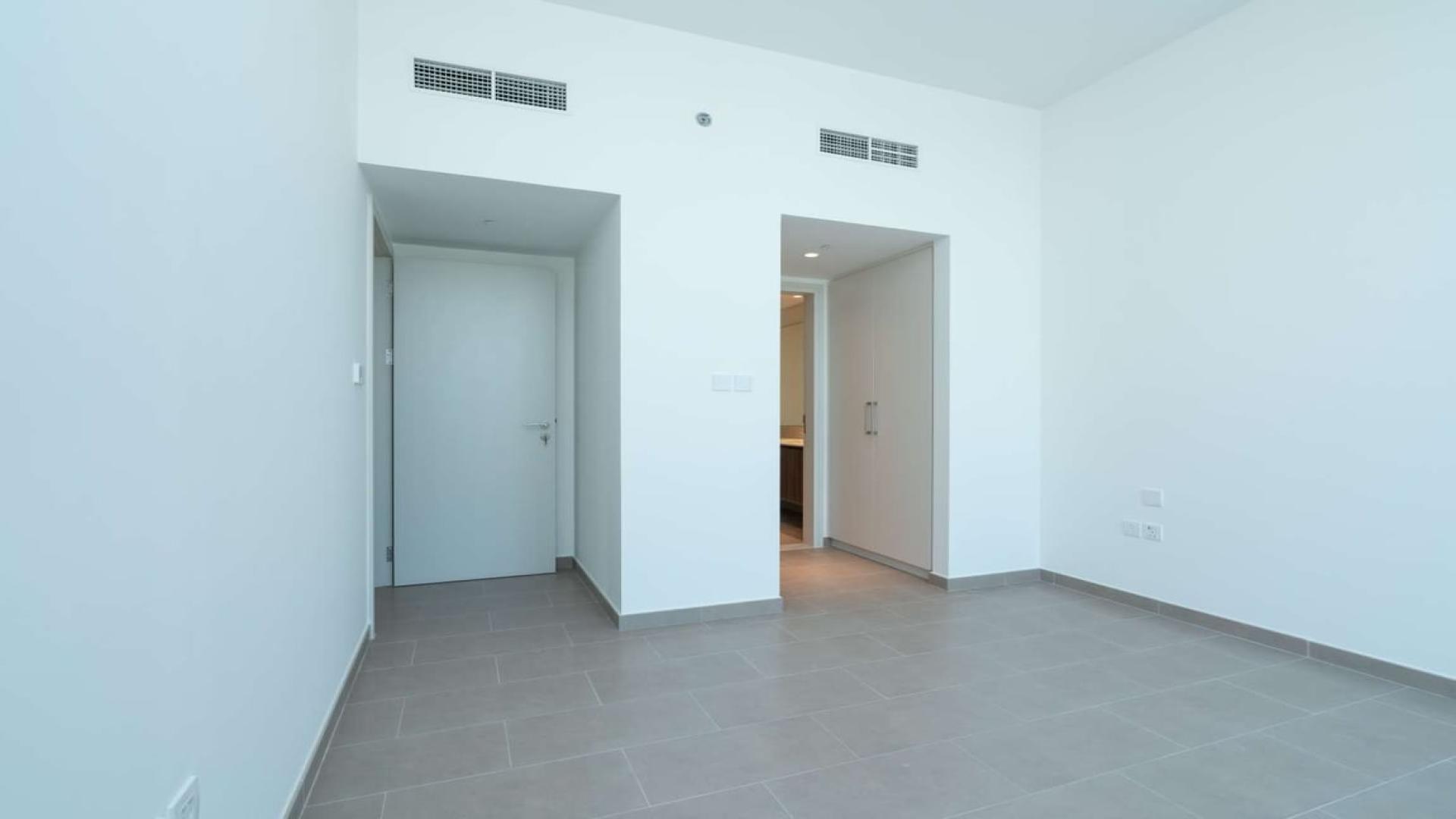 Bright living area with large windows in Park Heights apartment, Dubai Hills Estate