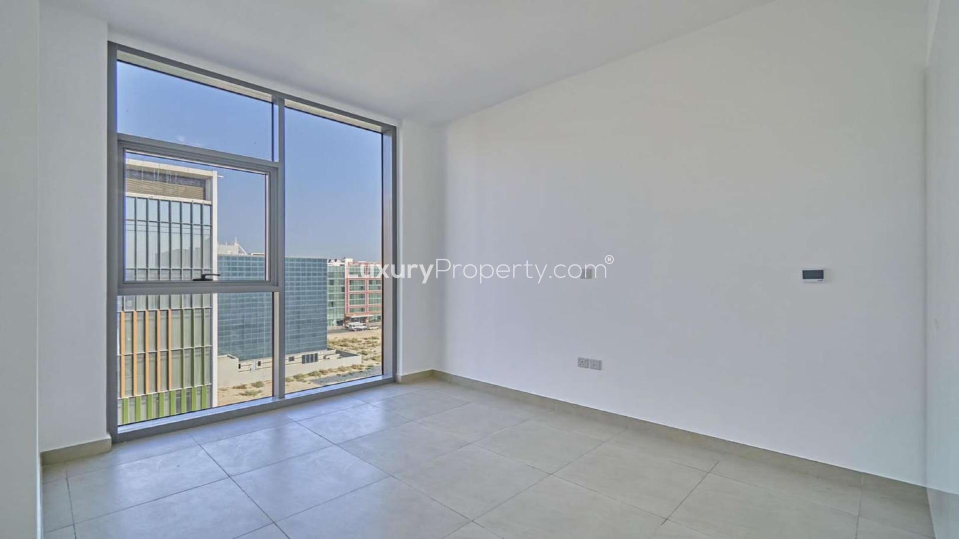 Modern lobby area in Al Barsha 1 apartment for rent, featuring stylish seating and decor