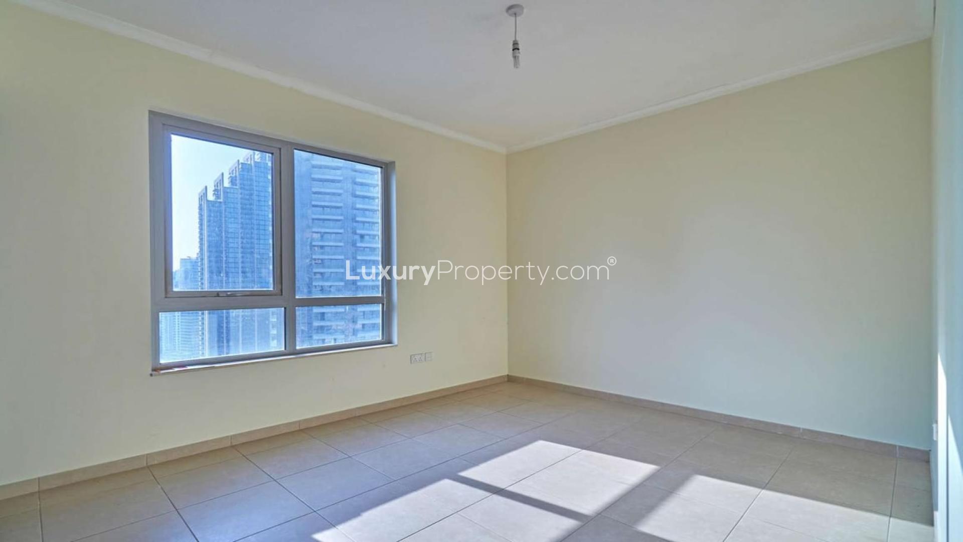 Balcony view from apartment in Downtown Dubai, overlooking skyscrapers and construction sites