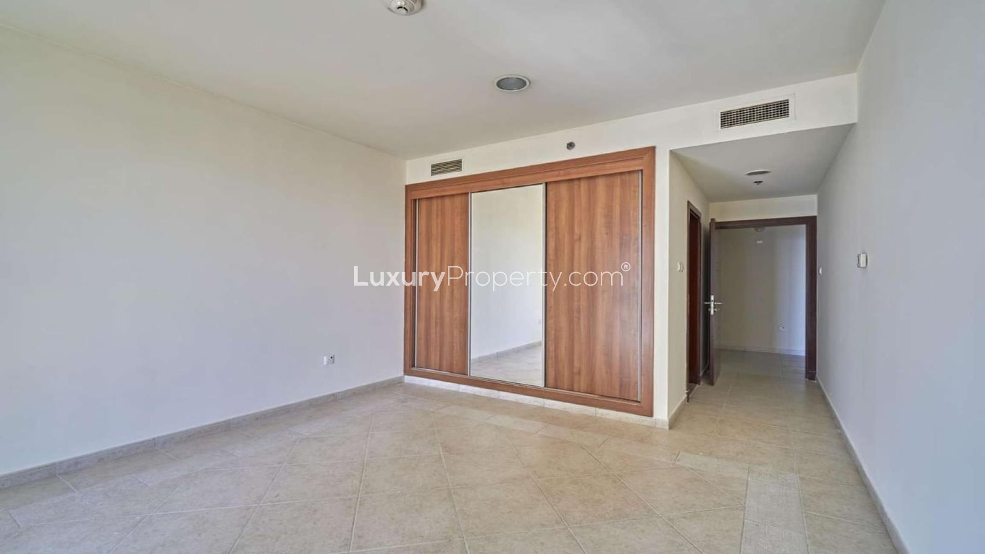Bright living room in 2-bedroom apartment, Princess Tower, Dubai Marina, large windows, tiled floor