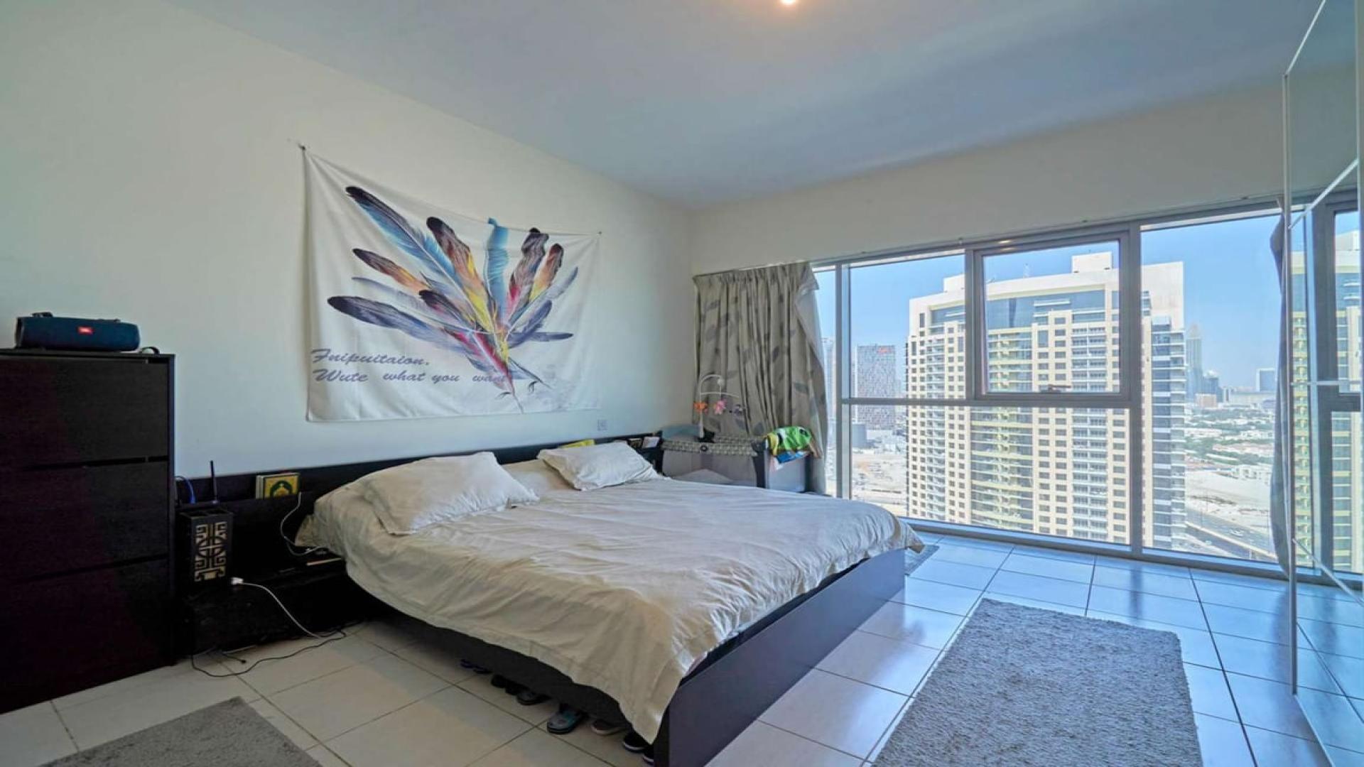 Stunning living room in Business Bay apartment with modern decor and canal views