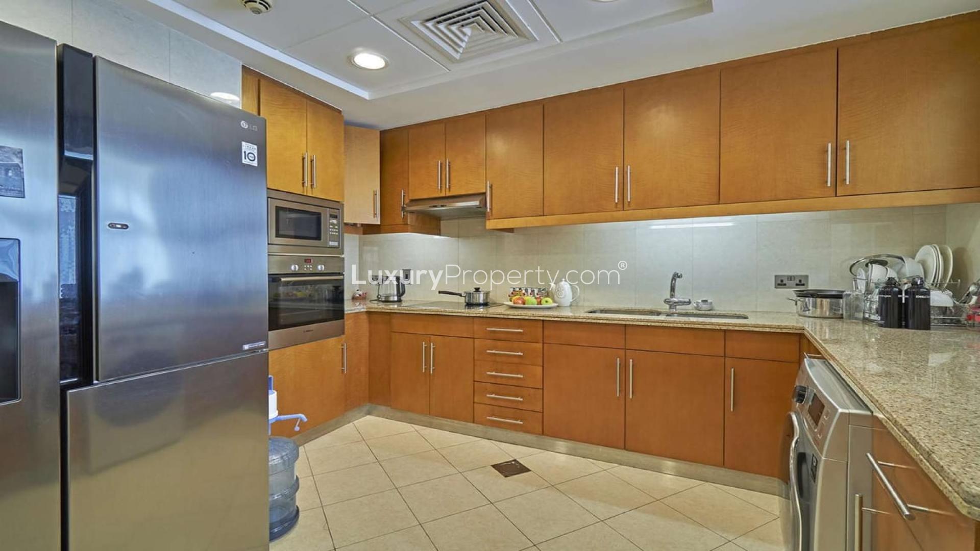 Outdoor seating area on a spacious balcony in Trident Grand, Dubai Marina apartment