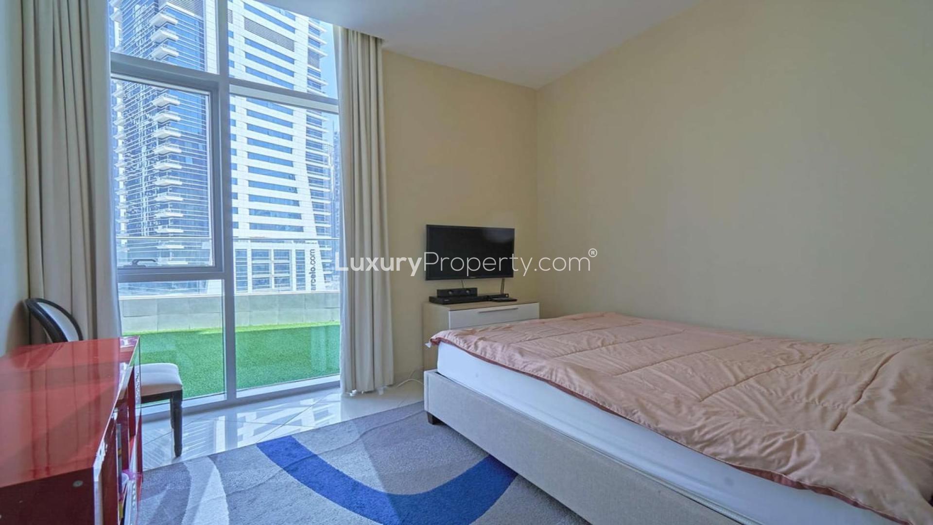 Terrace view from 2-bedroom apartment in Trident Grand, Dubai Marina, with skyline backdrop