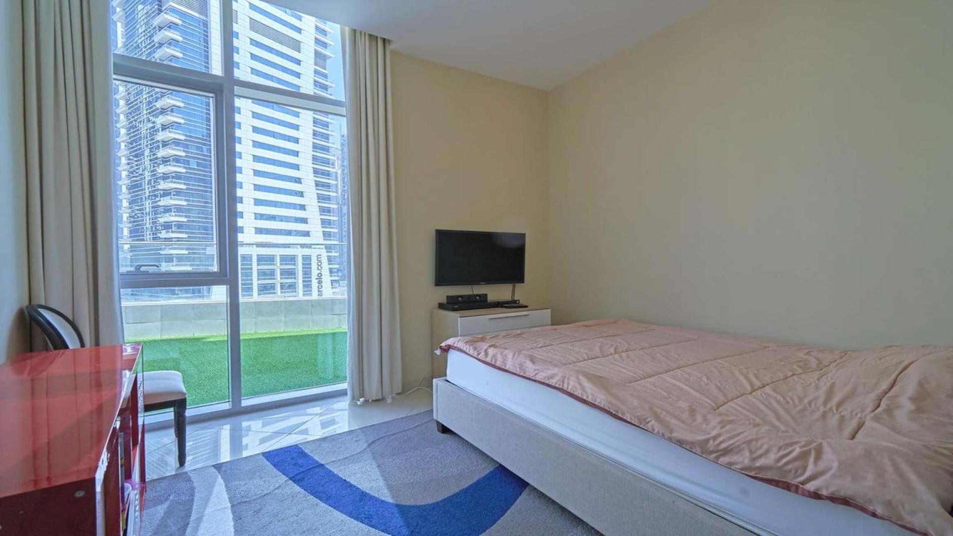 Terrace view from 2-bedroom apartment in Trident Grand, Dubai Marina, with skyline backdrop