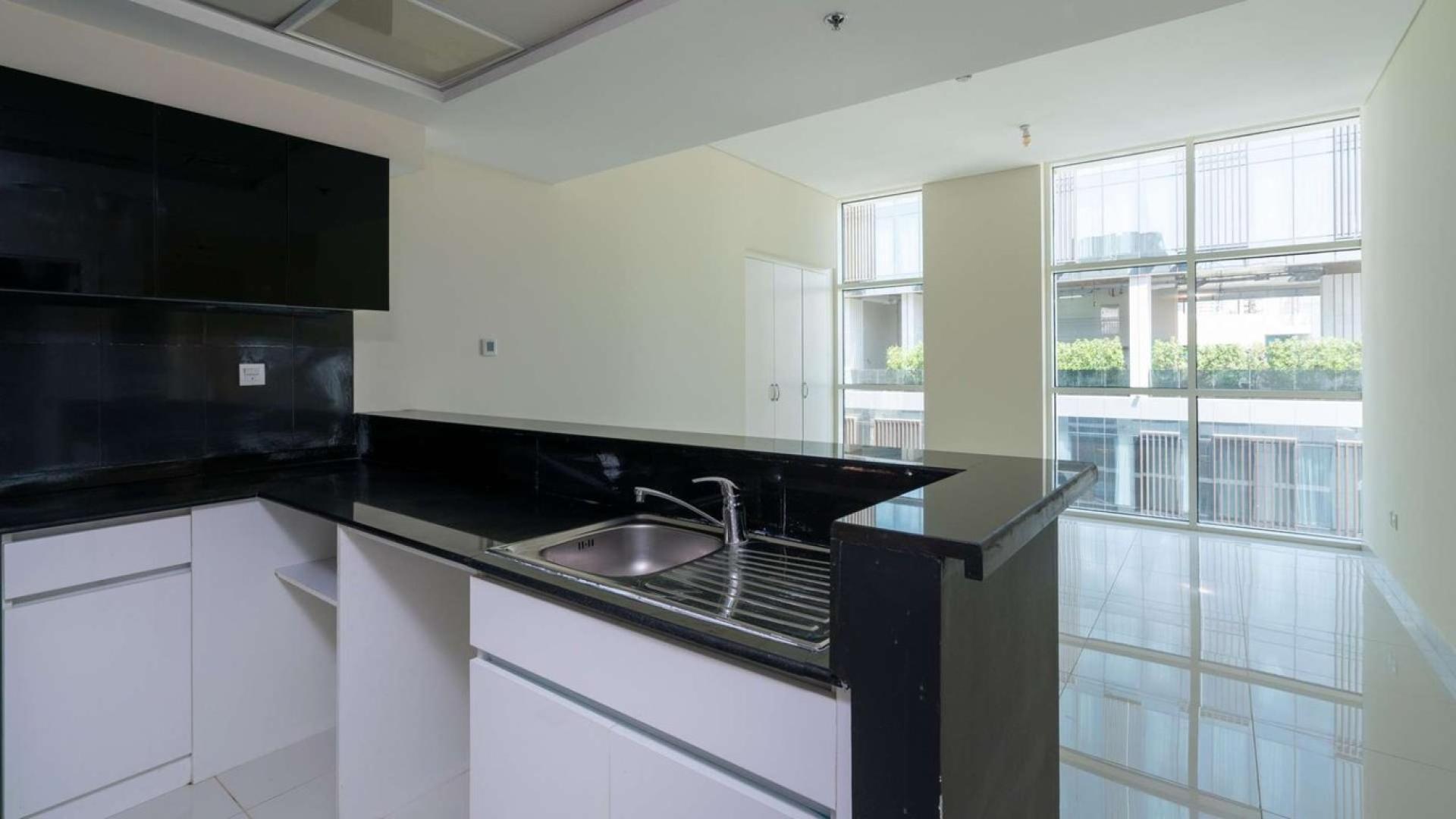 Bright room with large windows in two-bedroom apartment, Park Central, Business Bay