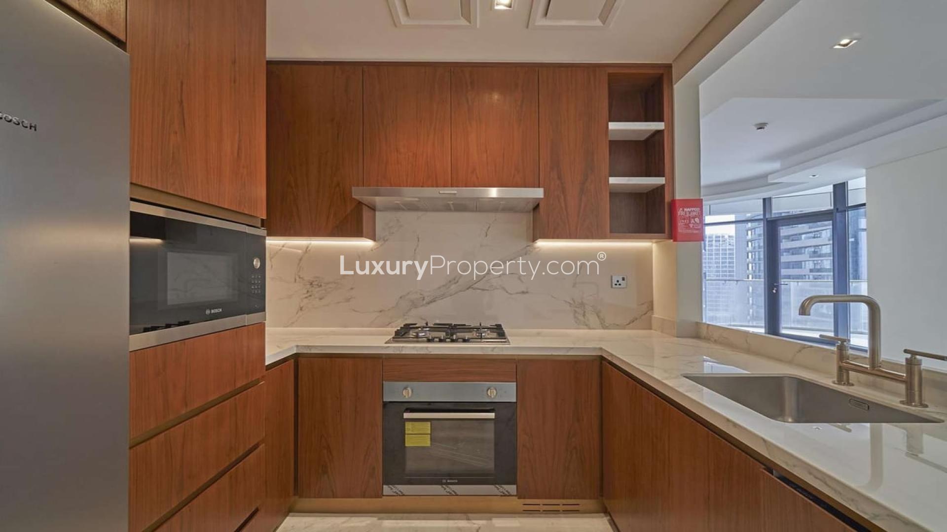 Bright living room with floor-to-ceiling windows in RP Heights, Downtown Dubai apartment