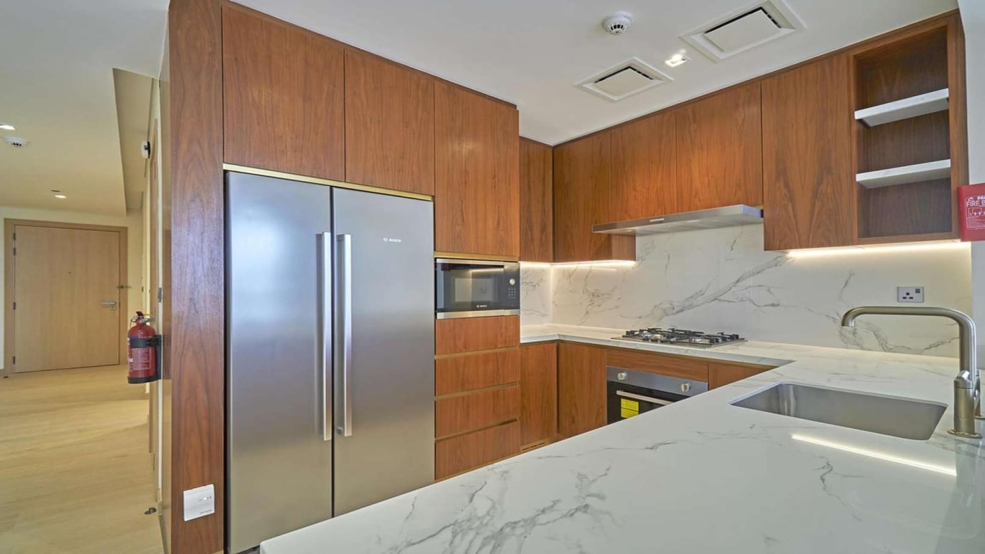 Open-plan living area in 2-BR apartment, RP Heights, Downtown Dubai, with city views