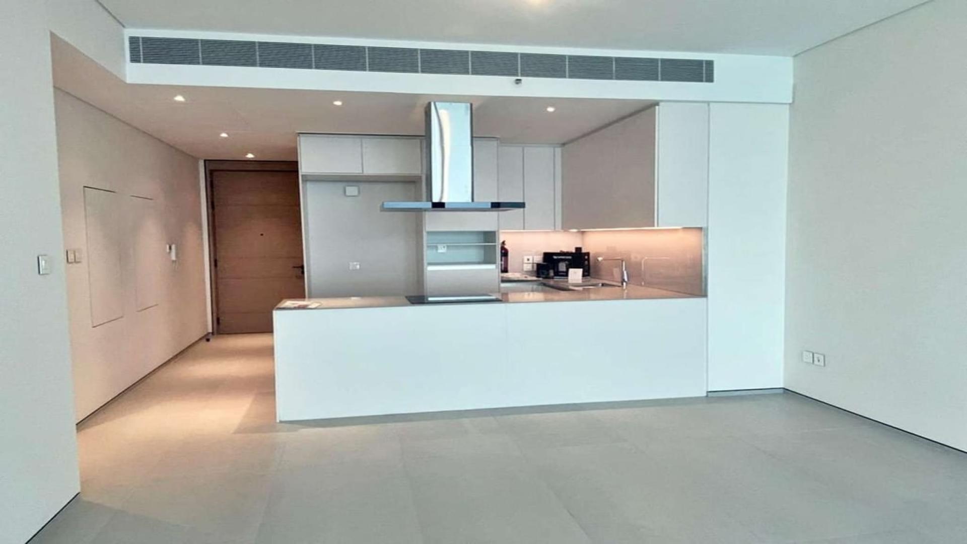 "Spacious two-bedroom apartment with sea view in The Address JBR, Jumeirah Beach Residence.",Modern kitchen in two-bedroom apartment, The Address JBR, Jumeirah Beach Residence for rent