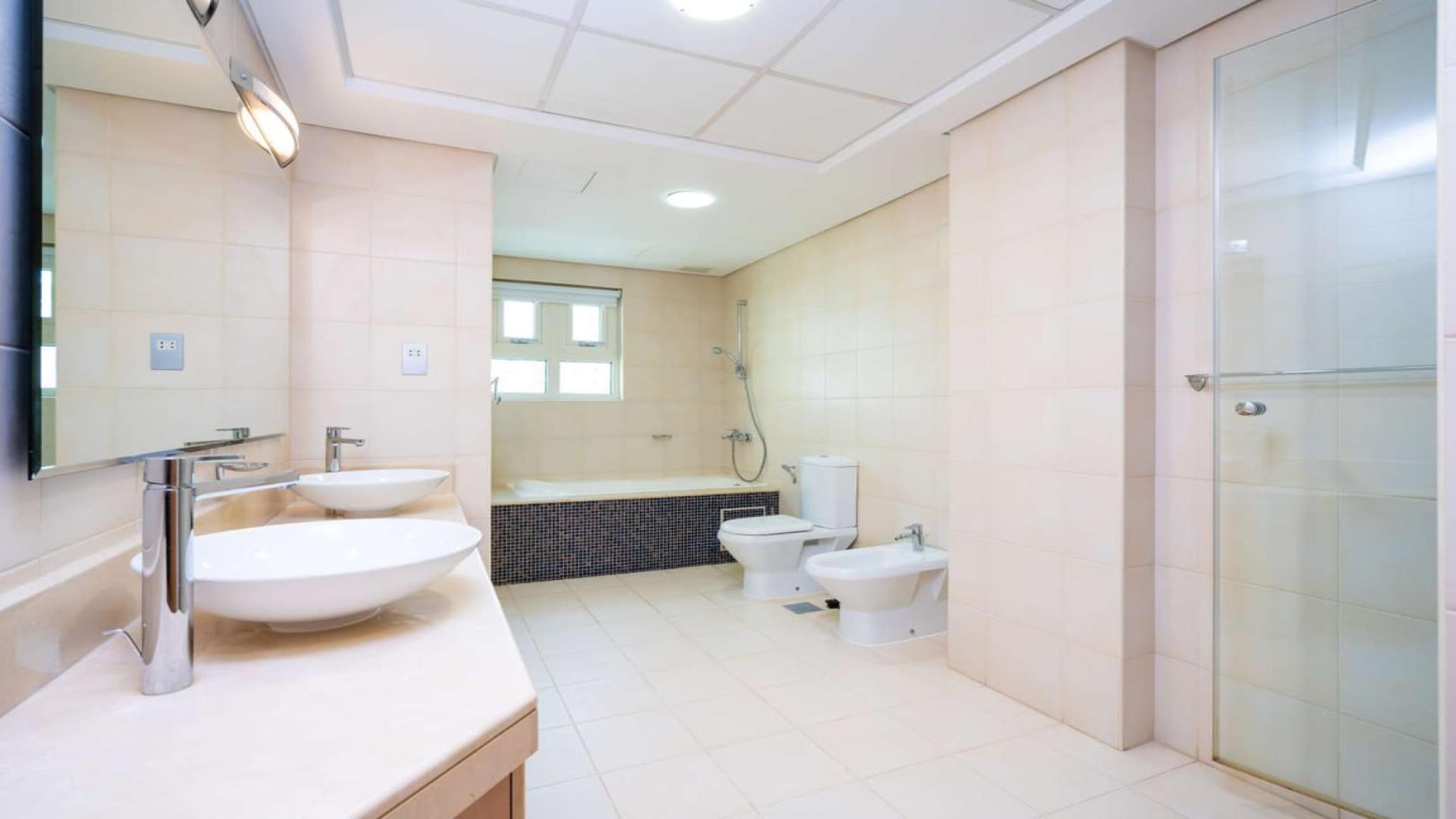 Furnished dining and living area in Shoreline Residences apartment, Palm Jumeirah, for rent