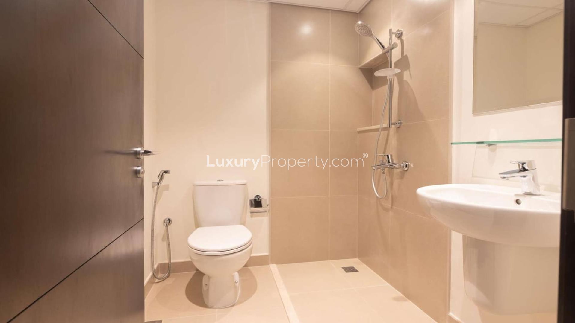 Infinity pool with stunning Dubai Creekfront views at Dubai Creek Harbour apartment